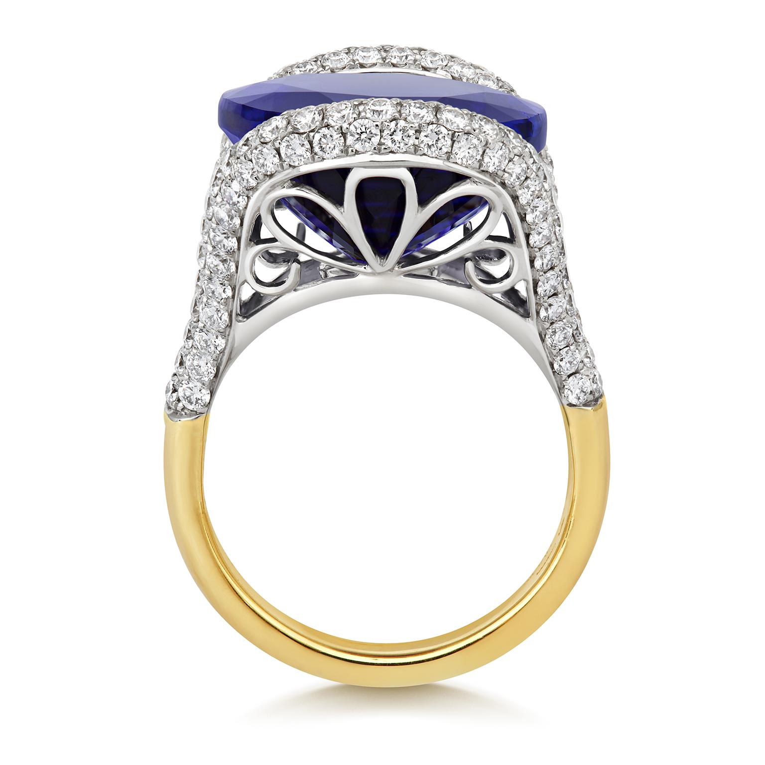 'THE BLUE TULIP' - This stunning gala cocktail ring has been crafted in 18ct white & yellow gold and set with 2.25ct of glittering fine white diamonds and a mesmerising AAAA+ 20.67ct royal violet-blue oval Tanzanite gemstone. Inspired by the tulips
