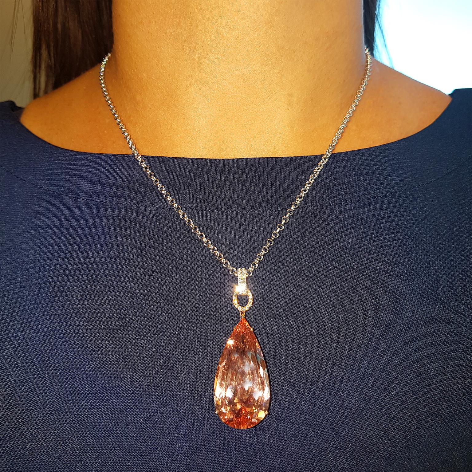 MAGNIFICENT MORGANITE! This gorgeous cocktail pendant has been crafted in 18ct White & Rose Gold and set with glittering fine white diamonds & rich 33.59ct peach-pink Brazilian Morganite. One-off & Exclusive! 18ct 18 inch chain included.