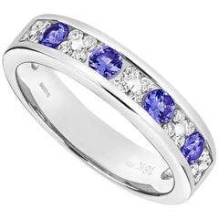 Tivon 18 Karat White Gold Tanzanite and Diamond Channel Set Eternity Ring