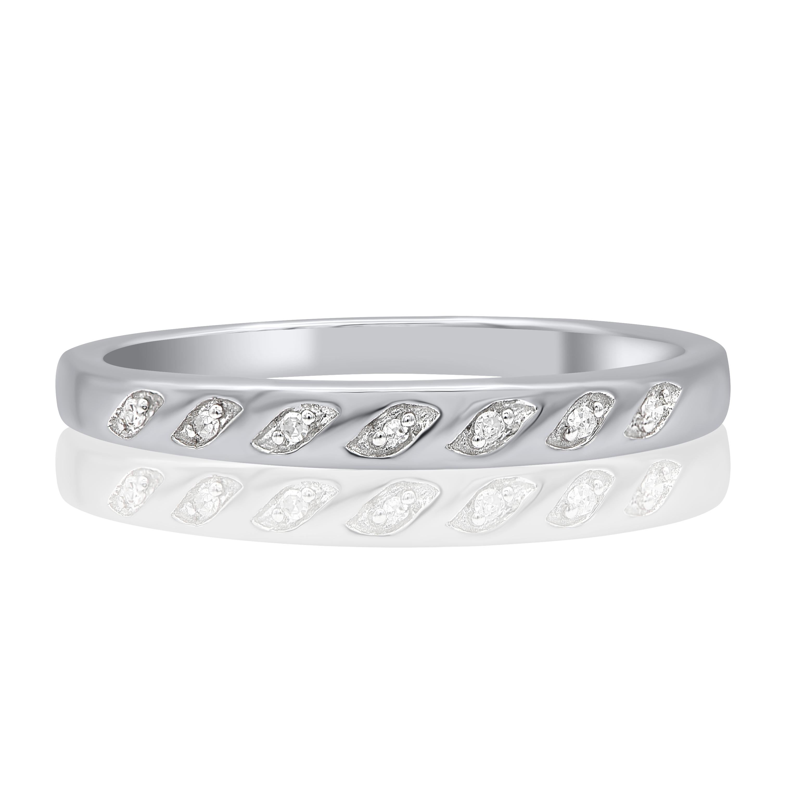 Bring charm to your look with this diamond wedding band Ring. This ring is beautifully crafted in 14 Karat white gold and embedded with 7 natural single cut diamonds in pave setting. Total diamond weight is 0.02 carat. The diamonds are graded as H-I