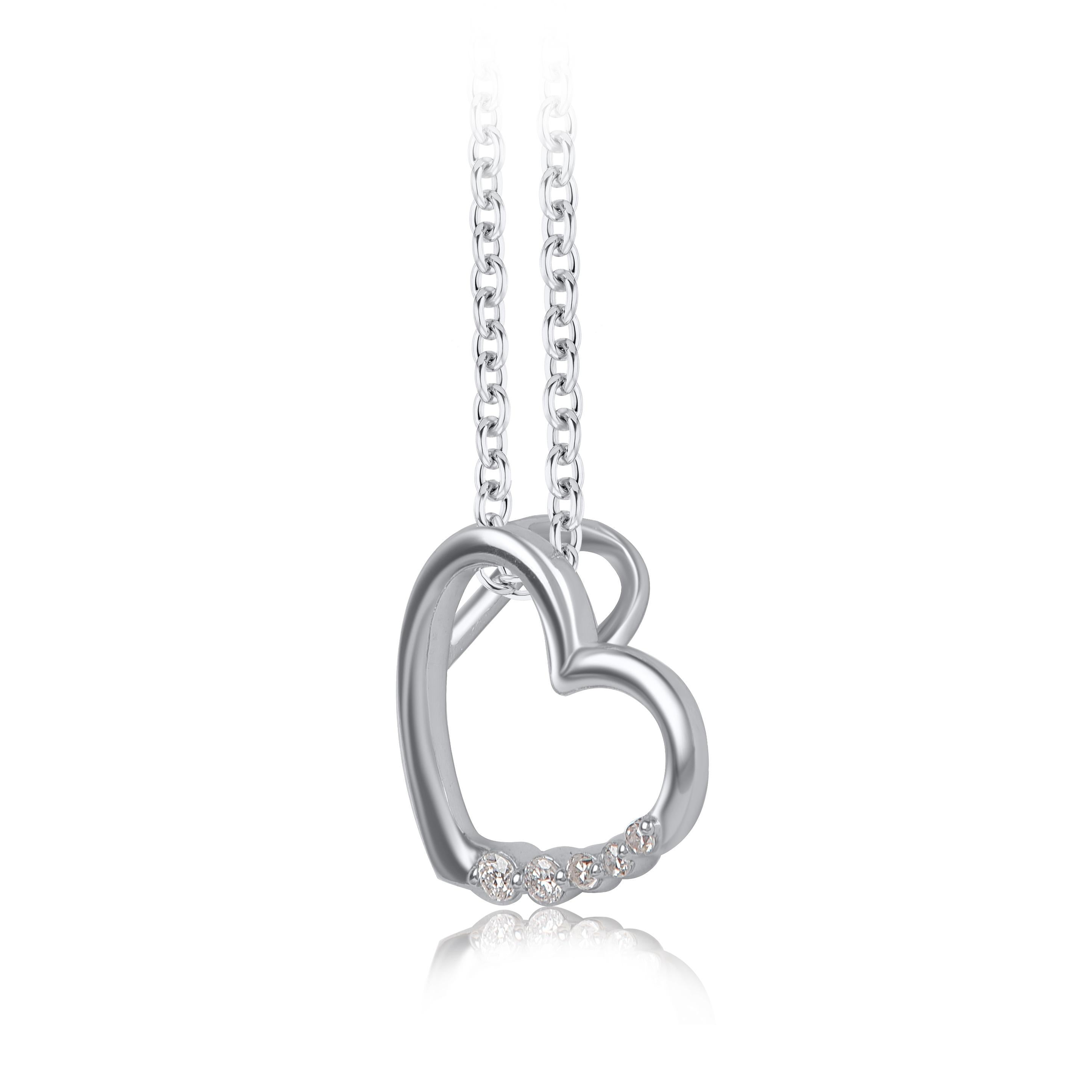 Surprise the one you love with this mesmerizing diamond heart pendant. This heart pendant is crafted from 14-karat white gold and features 5 single cut & brilliant cut diamonds set in prong setting. H-I color I2 clarity and a high polish finish