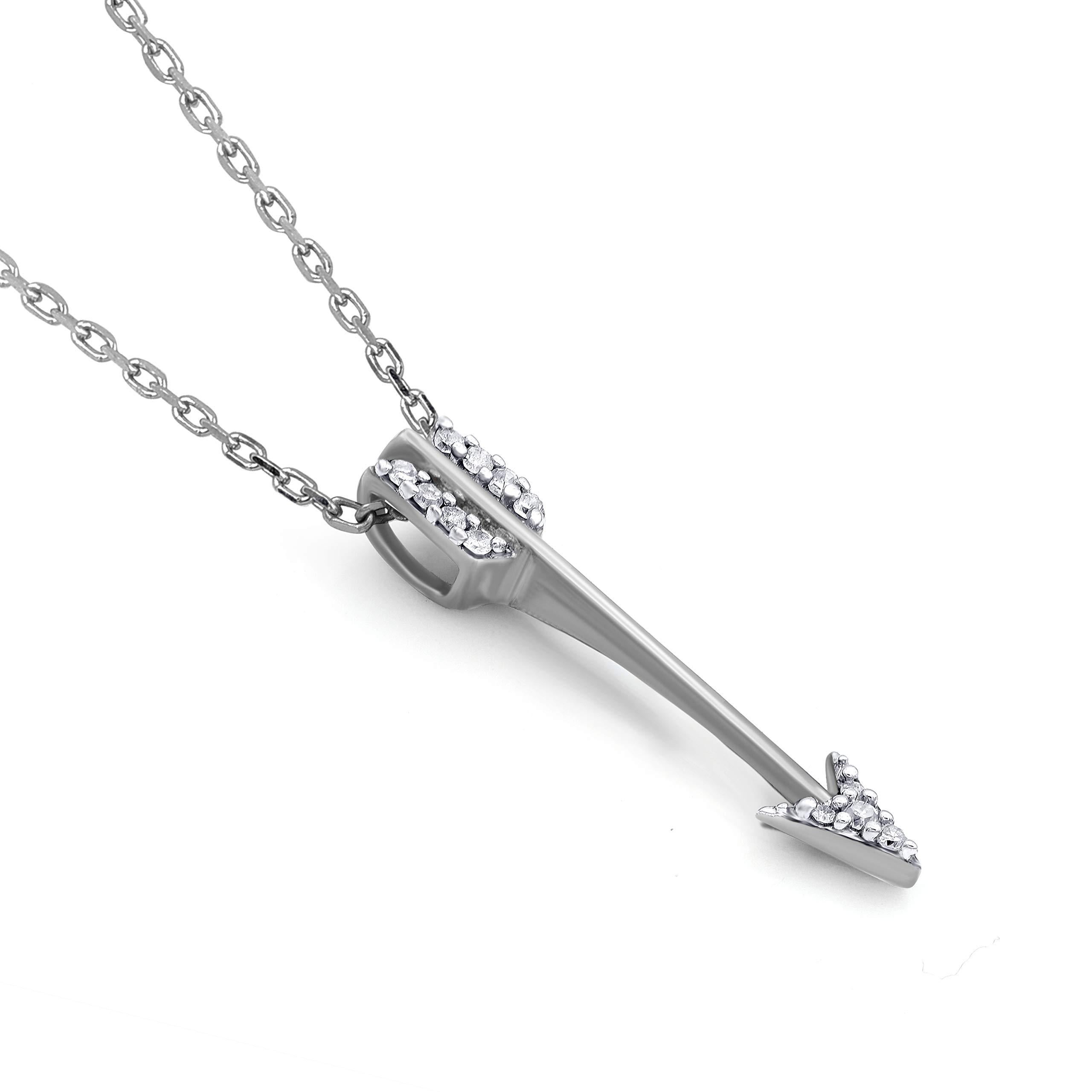 A striking addition when worn on its own, this diamond pendant makes a stunning impression. This arrow pendant is crafted from 14-karat white gold and features 12 single cut diamonds set in prong setting. H-I color I2 clarity and a high polish