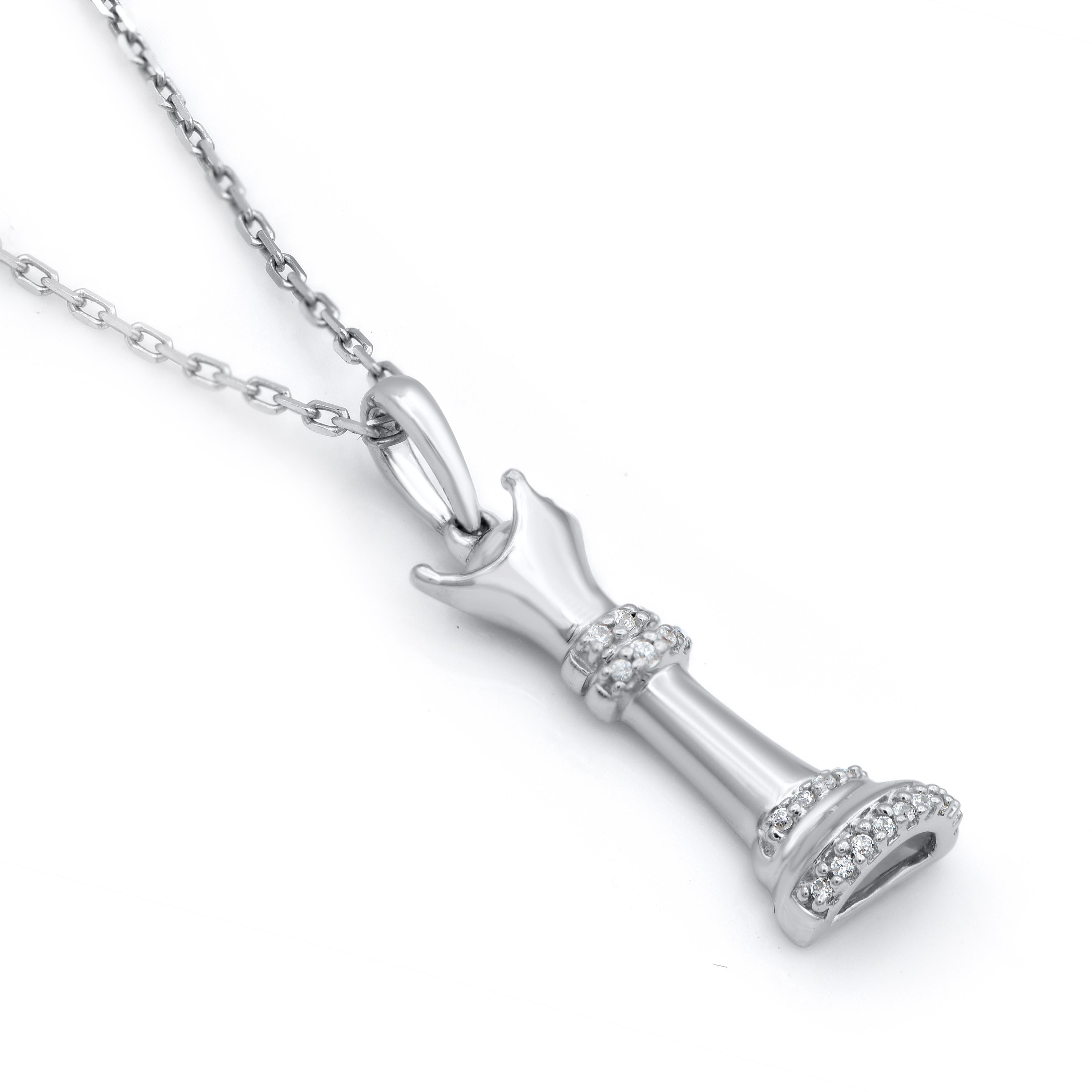 A striking addition when worn on its own, this diamond pendant makes a stunning impression. This king pendant is crafted from 14-karat white gold and features 21 single cut diamonds set in prong setting. H-I color I2 clarity and a high polish finish