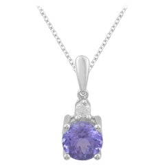 TJD 0.05 Carat Diamond and 6MM Round Tanzanite 14 Karat White Gold Halo Pendant
