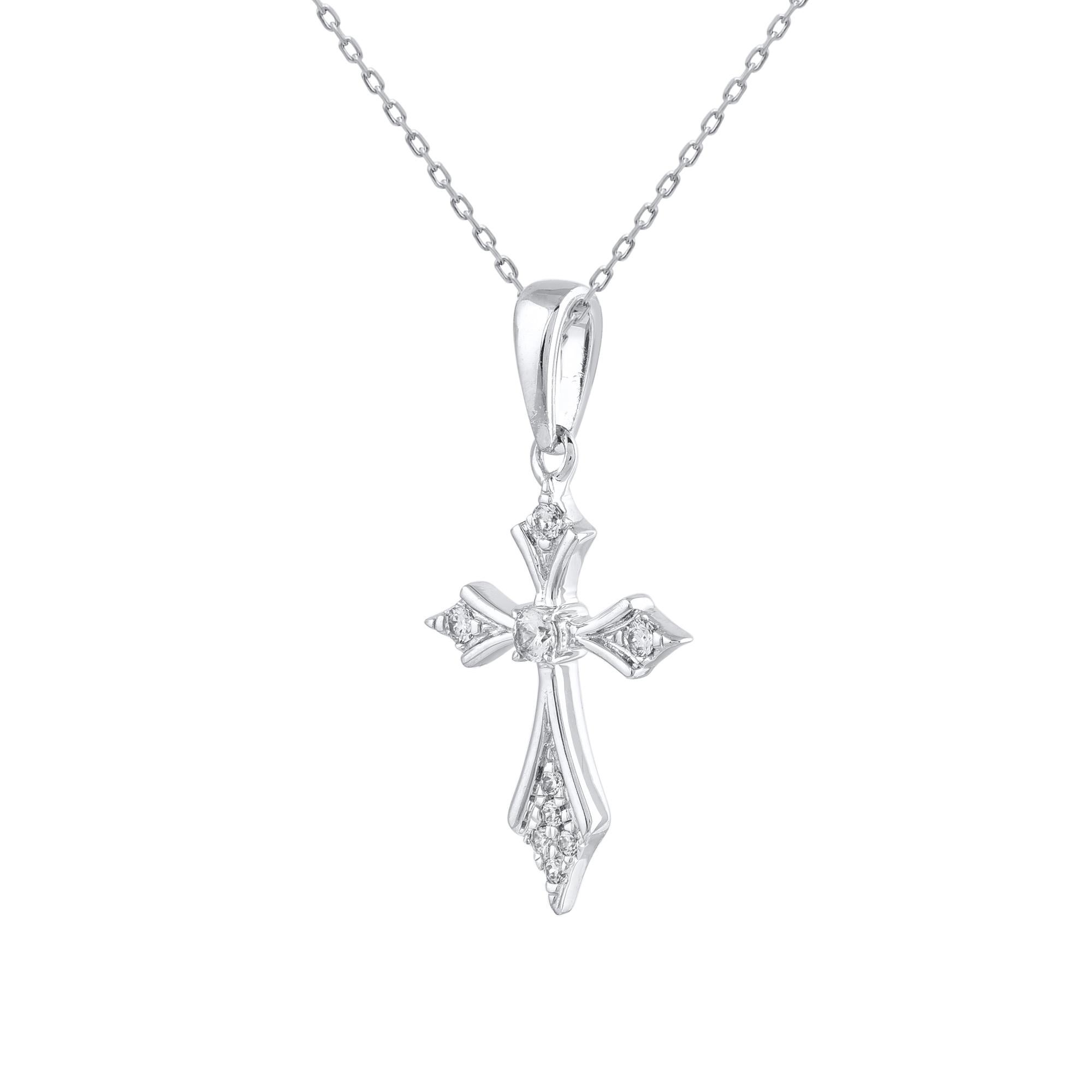 The traditional cross pendant has been given an update with the emphasis on style. Beautifully crafted by our inhouse experts in 14 karat white gold and embellished with 9 single cut & brilliant cut round diamond in prong setting. The total diamond