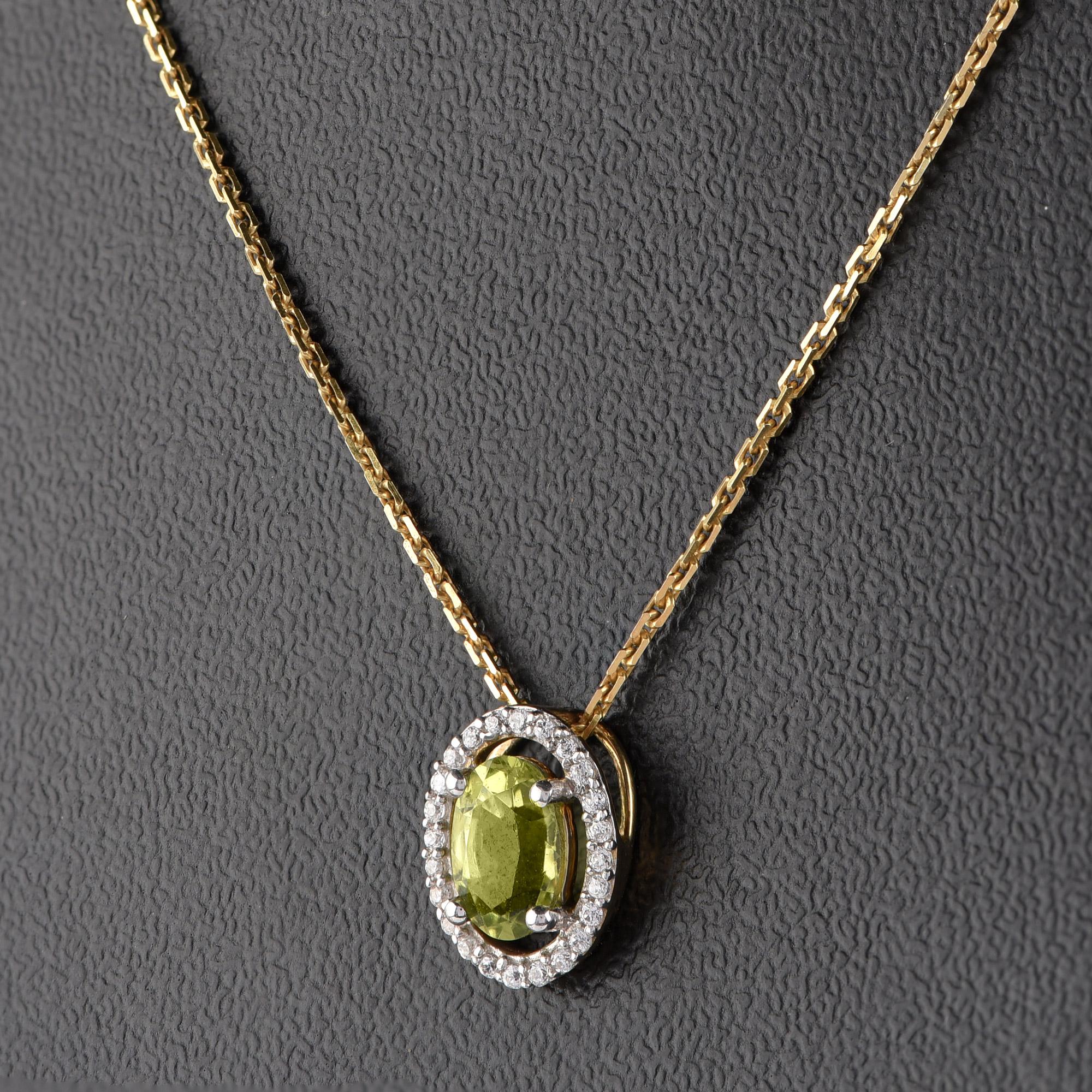 This dazzling design features 24 brilliant-cut diamonds and 1 peridot gemstone embedded beautifully prong setting and crafted in cool 18 kt yellow gold. The diamonds are graded H-I Color, I2 Clarity. 

This piece is made to order. Please allow 2-3