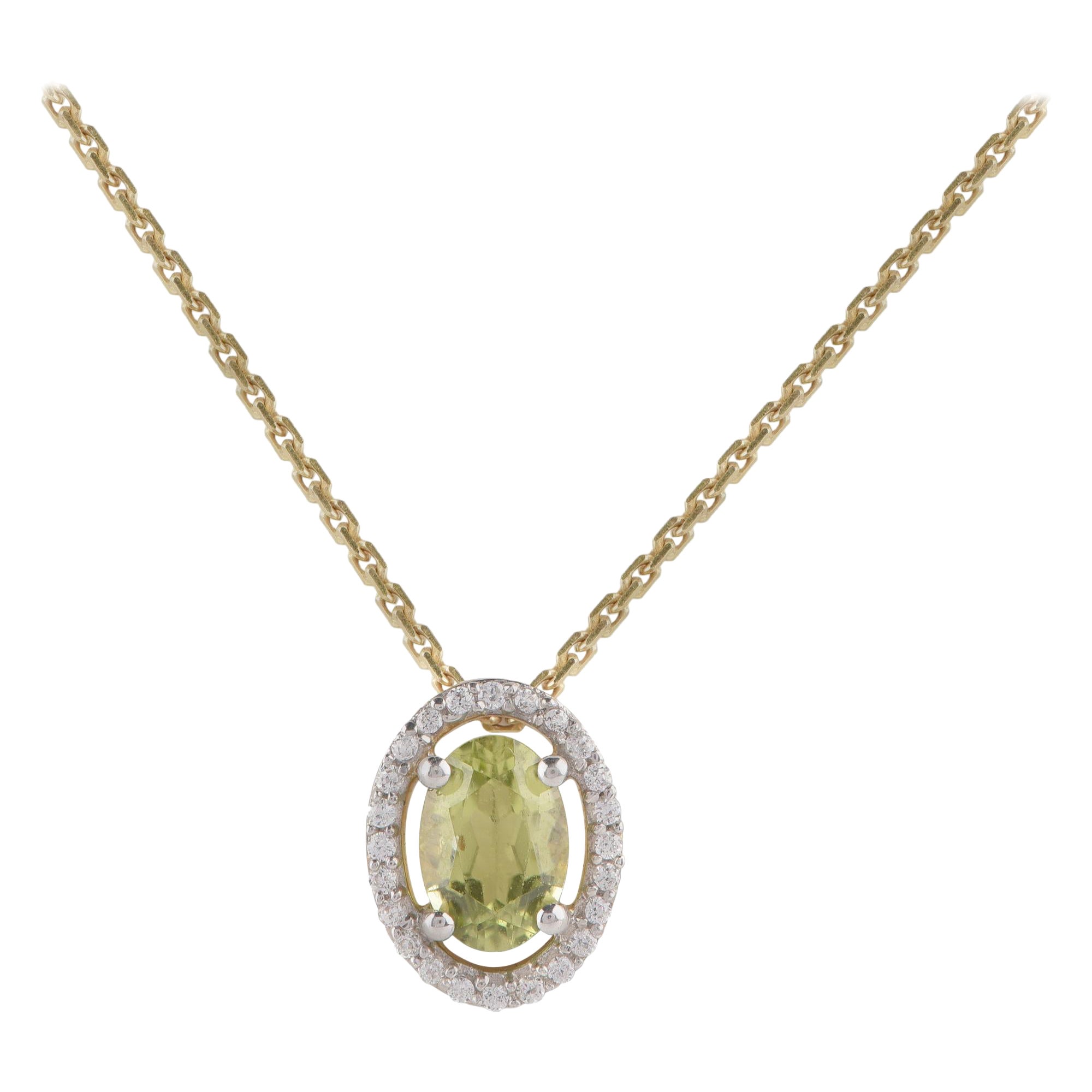 TJD 0.07 Carat Diamond and 6X4MM Oval Peridot 18 Karat Yellow Gold Halo Pendant