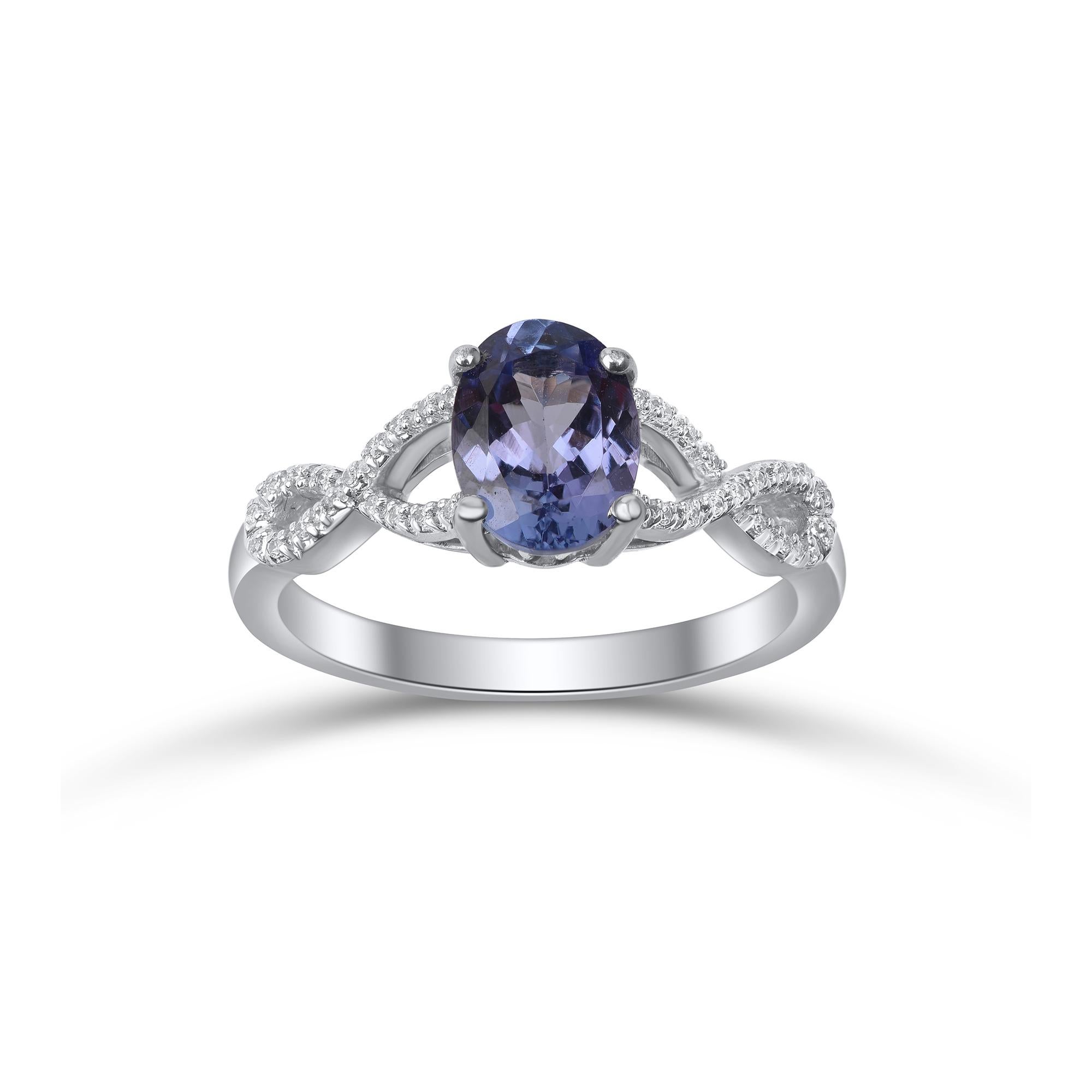 Modern TJD 0.07 Carat Diamond and 8 X 6 MM Natural Tanzanite 14K White Gold Twist Ring For Sale