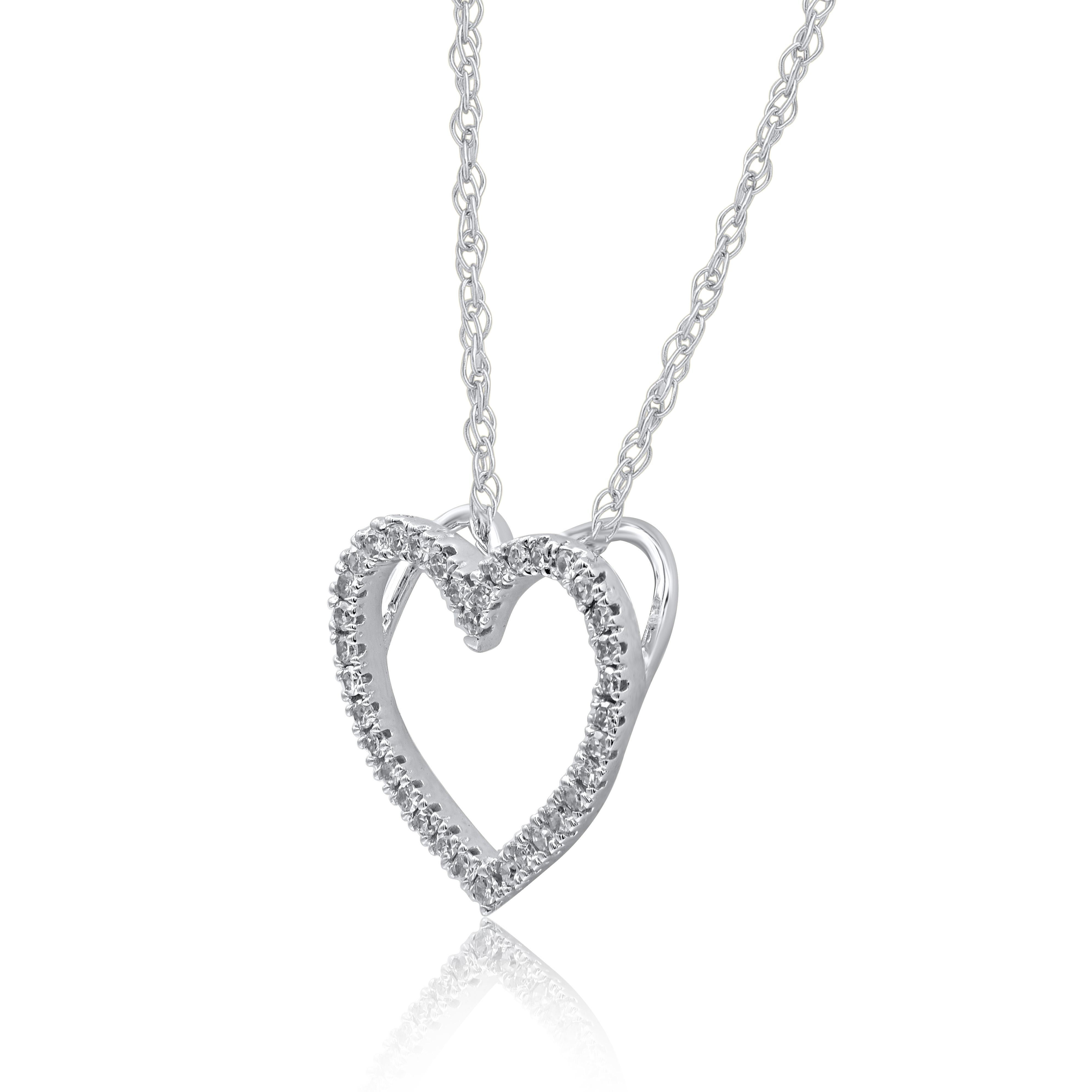 A striking addition when worn on its own, this diamond pendant makes a stunning impression. This heart pendant is crafted from 14-karat white gold and features 36 single cut diamonds set in prong setting. H-I color I2 clarity and a high polish