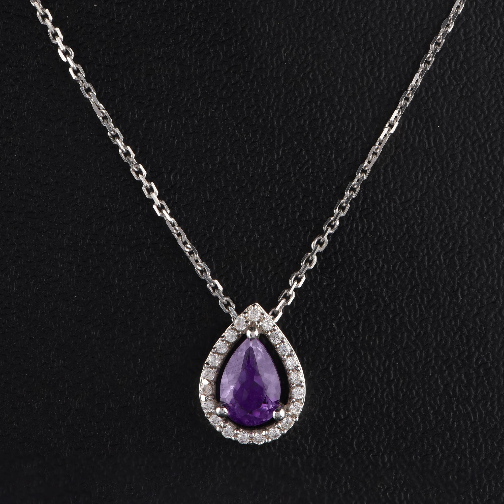 Elegant pendant necklace made to perfection in 18-karat white gold, studded beautifully with 21 brilliant-cut and one amethyst gemstone embellished in prong setting. The diamonds are graded H-I Color, I2 Clarity. The pendant comes along with an 18