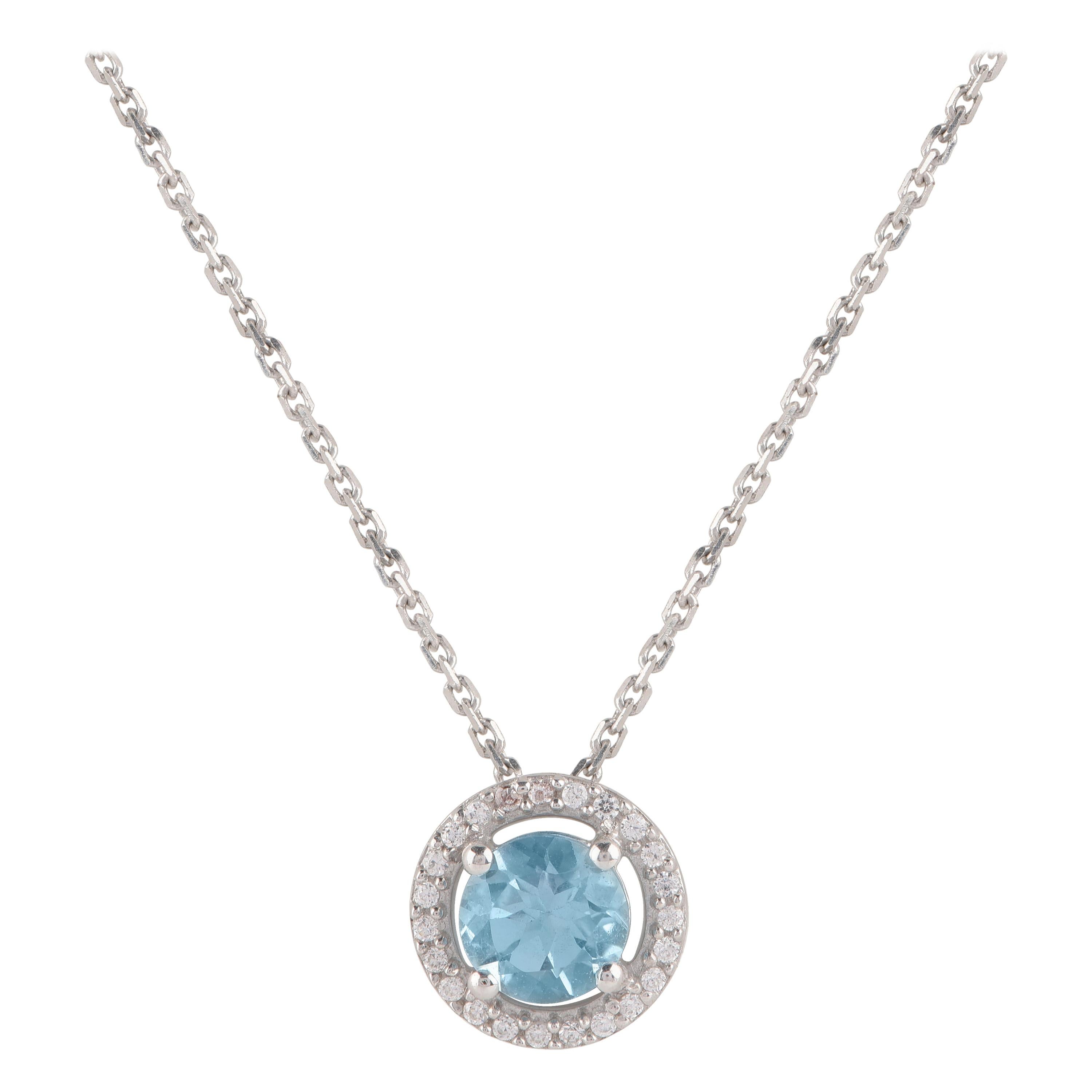 TJD 0.07 CTW Diamond and 5MM Round Swiss Blue Topaz 18K White Gold Halo Pendant