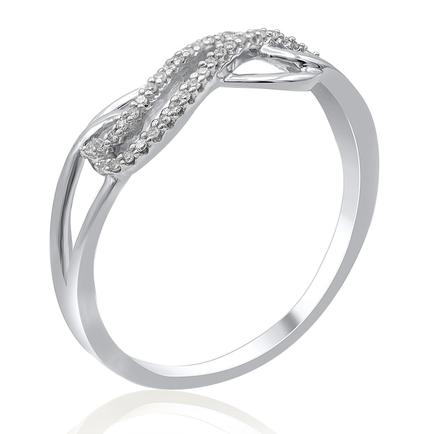 Truly exquisite, this infinity diamond wedding band ring is sure to be admired for the inherent classic beauty and elegance within its design. This infinity ring is crafted from 14-karat white gold and features 40 round single cut diamonds set in