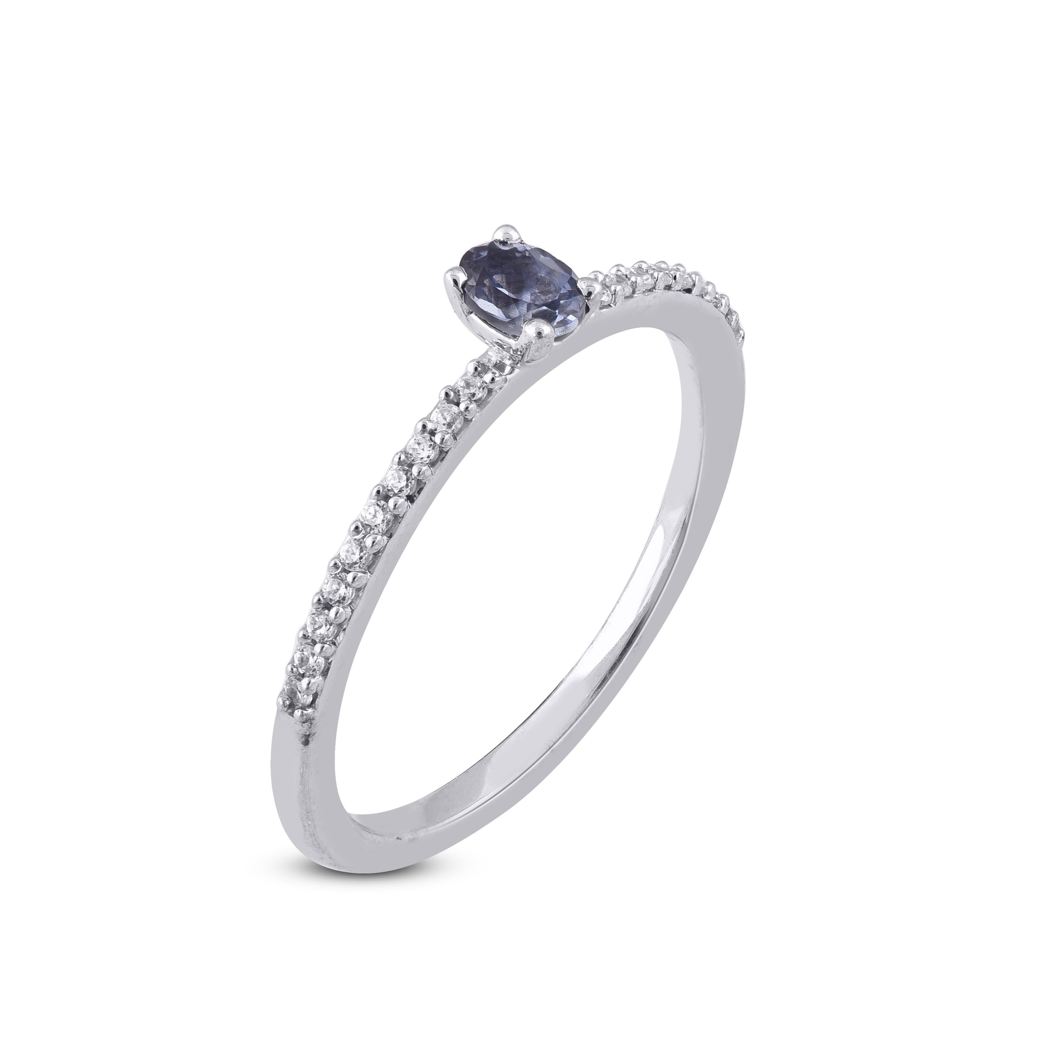 You'll adore the petite touch of shimmer these diamond ring add to your attire. Beautifully hand-crafted by our inhouse experts in 14 karat White gold and embellished with 20 round, and 1 Oval cut Tanzanite set in prong setting and shimmers with H-I