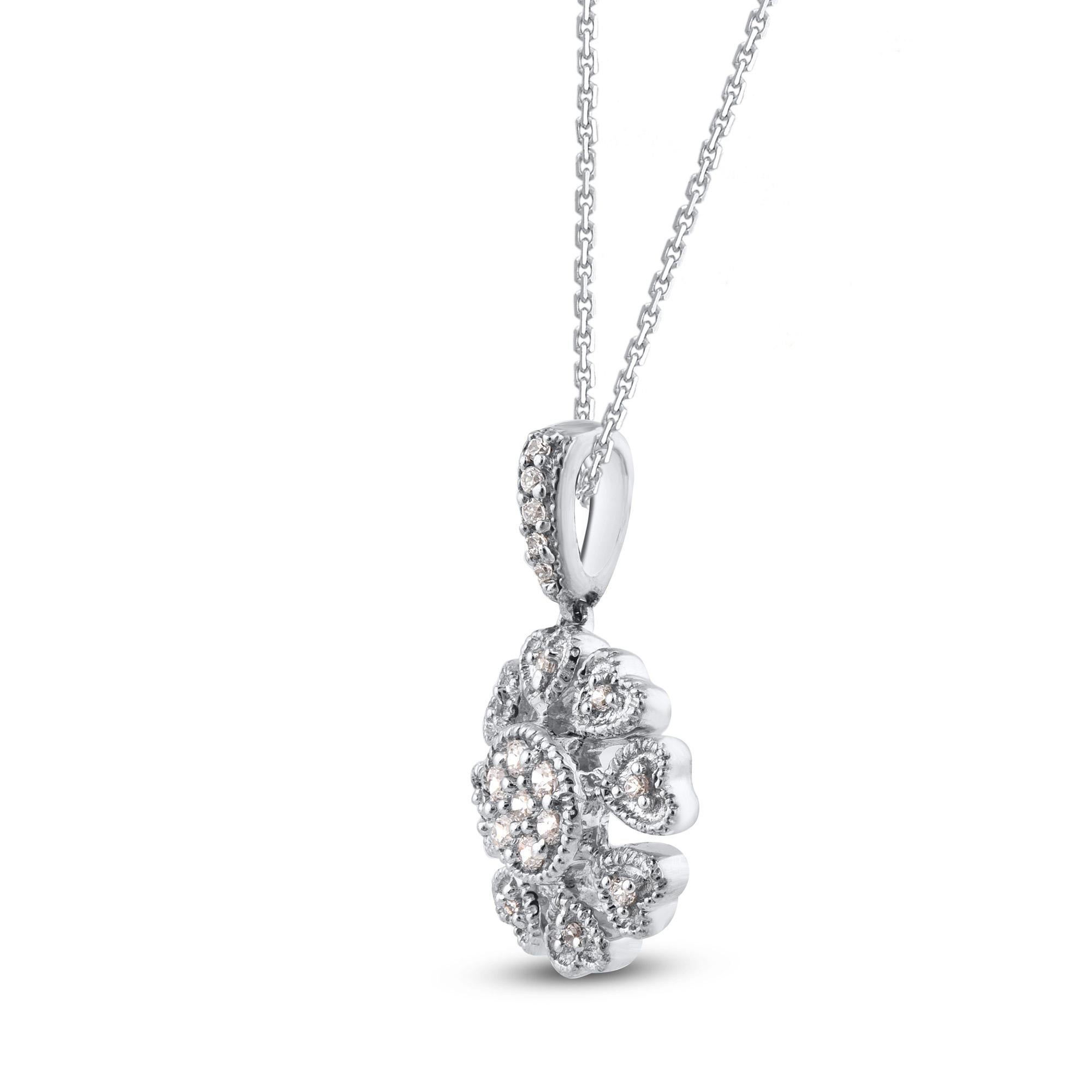 Bring charm to your look with this diamond pendant. The pendant is crafted from 14-karat white gold and features 20 brilliant cut and single cut diamonds in pave set. H-I color I2 clarity and a high polish finish complete the brilliant