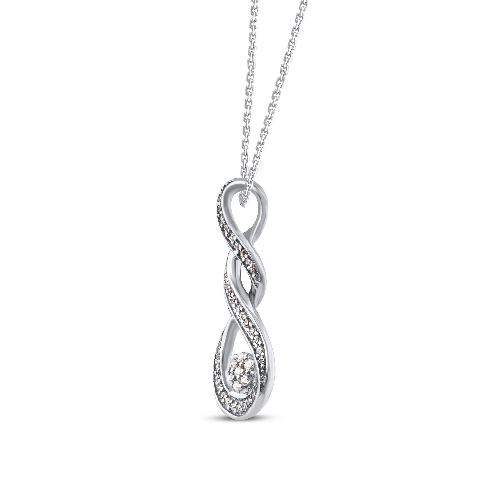 Bring charm to your look with this diamond pendant. The pendant is crafted from 14-karat white gold and features round single cut 39 white diamonds in prong & pave set, H-I color I2 clarity and a high polish finish complete the brilliant