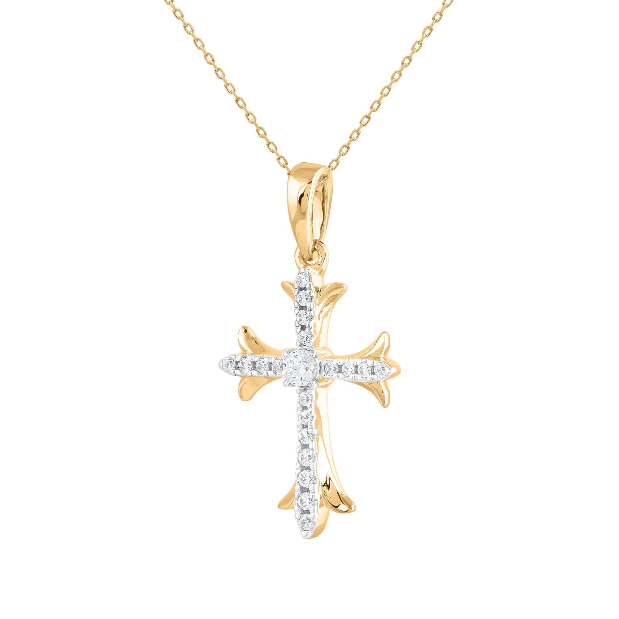 Le traditionnel pendentif en forme de croix a été remis au goût du jour en mettant l'accent sur le style. Magnifiquement conçu par nos experts en or 14 carats bicolore et orné de 20 diamants ronds en serti clos. Le poids total du diamant est de 0,10