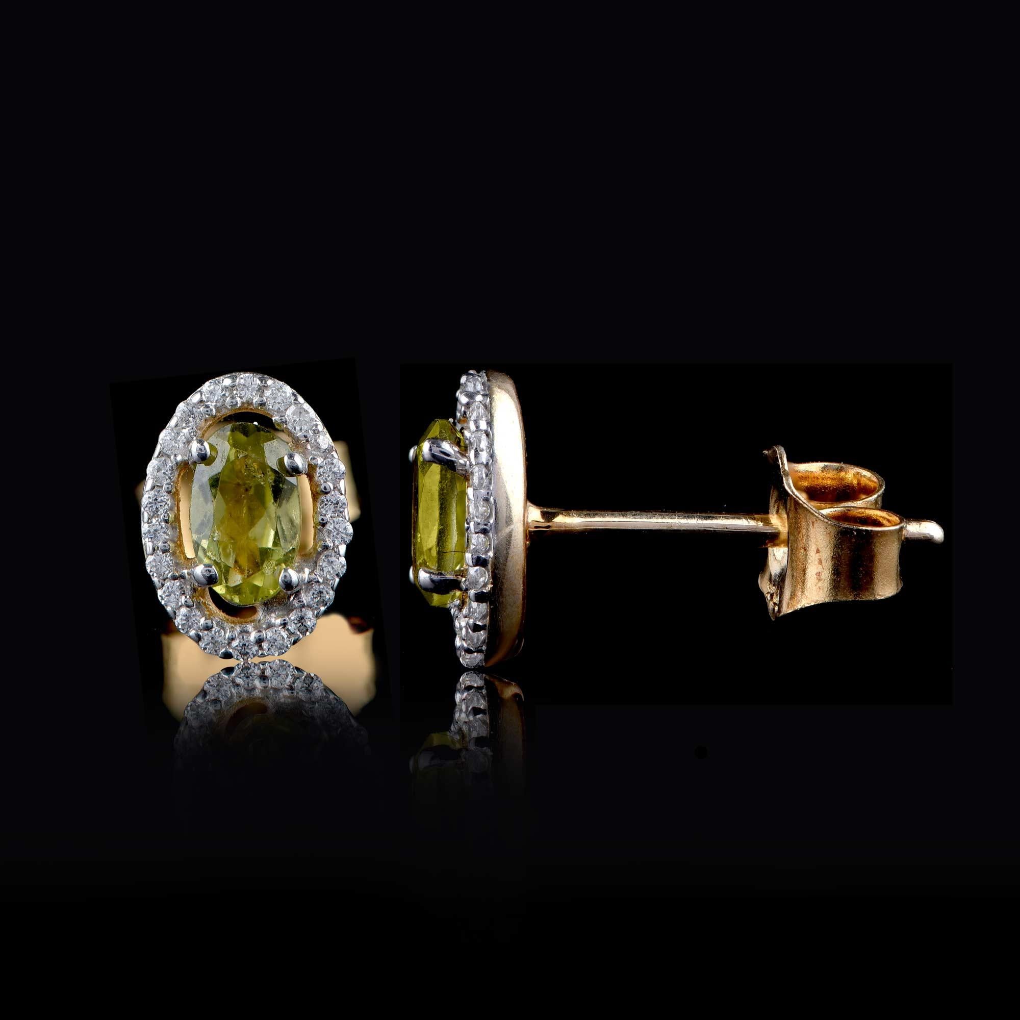 Round Cut TJD 0.10 CT Diamond and 5X3MM Oval Peridot 18 Karat Yellow Gold Halo Earrings For Sale