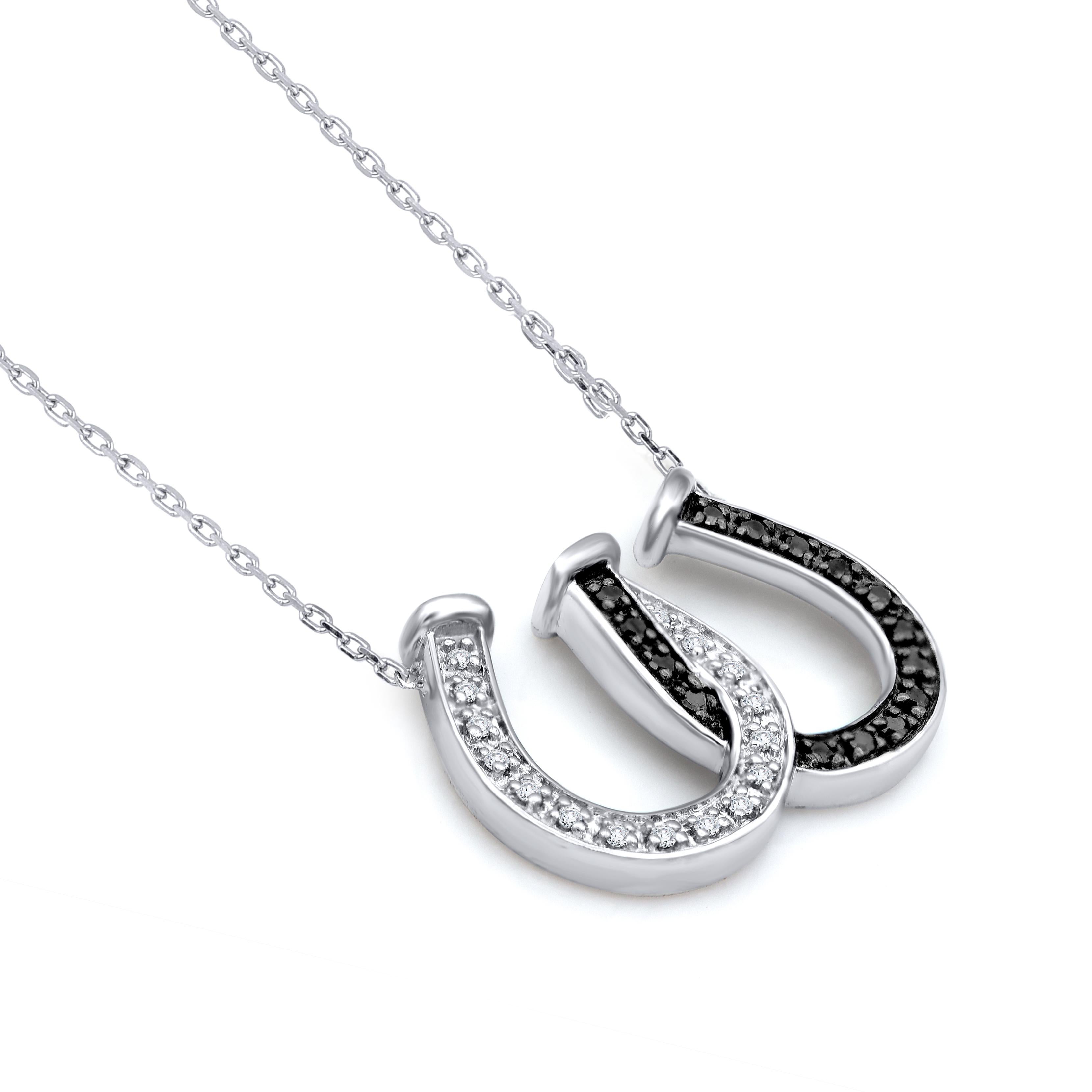 Embrace yourself with this breath-taking diamond studded pendant that is ready to make you shine. The pendant is crafted from 14-karat gold and features 31 round single cut and black treated diamonds, Prong set, H-I color I2 clarity and a high
