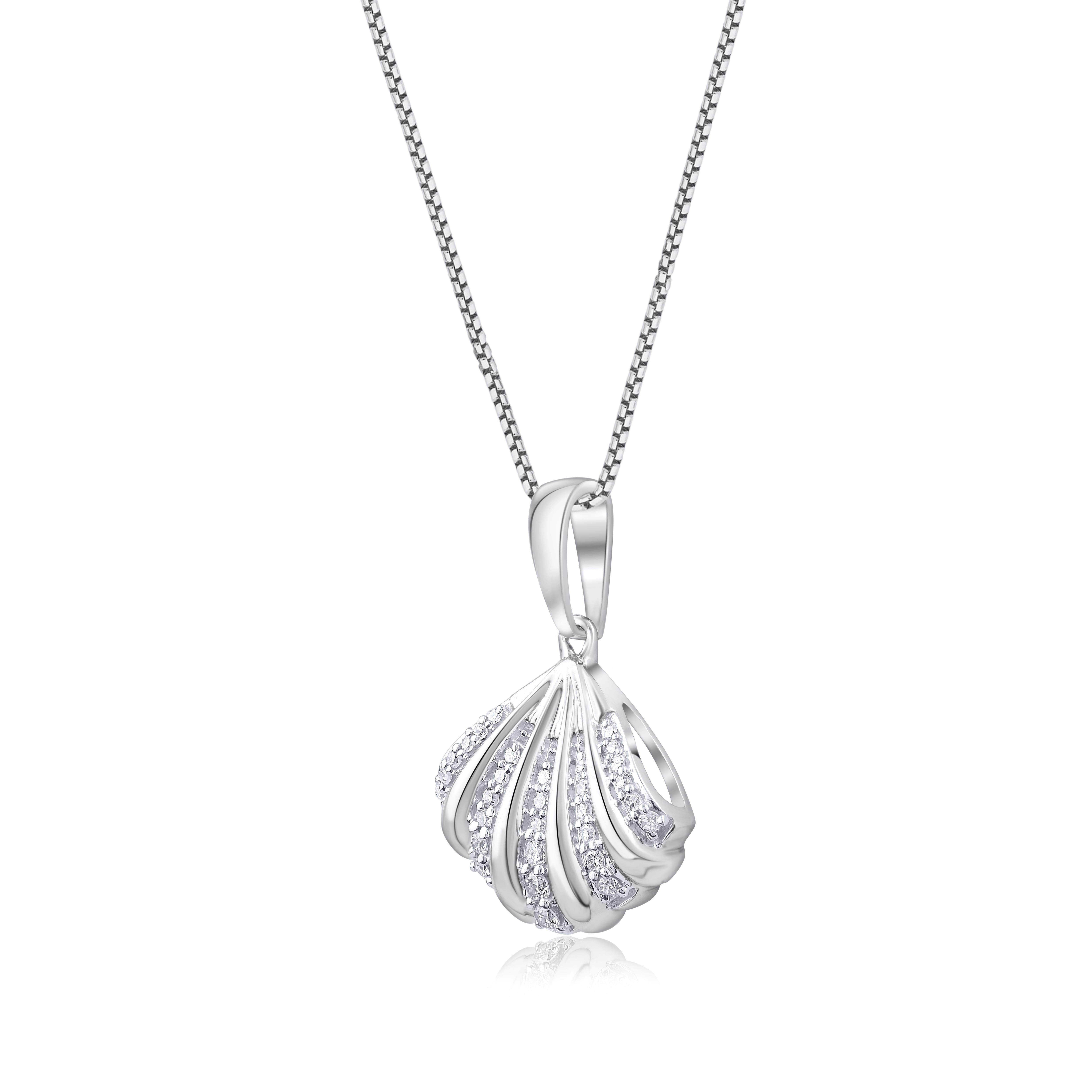 Bring charm to your look with this diamond shell pendant. Made by skillful craftsmen in 14KT white gold and studded with 30 round natural single cut and brilliant cut white diamonds in pave setting and shine in H-I Color I2 Clarity. The total