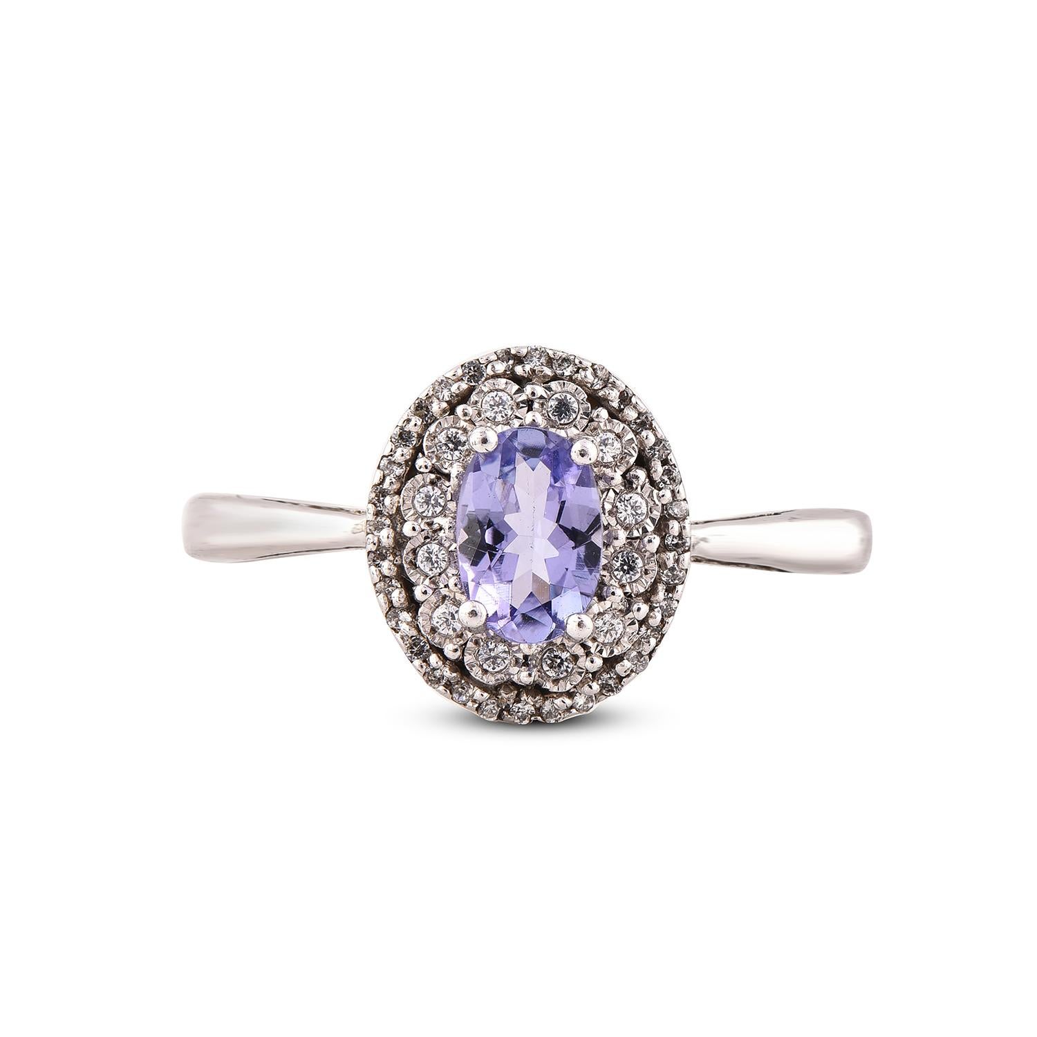 Art Deco TJD 0.13 CT Diamond and 6X4mm Oval shape Swiss Blue Topaz 14 KT White Gold Ring For Sale