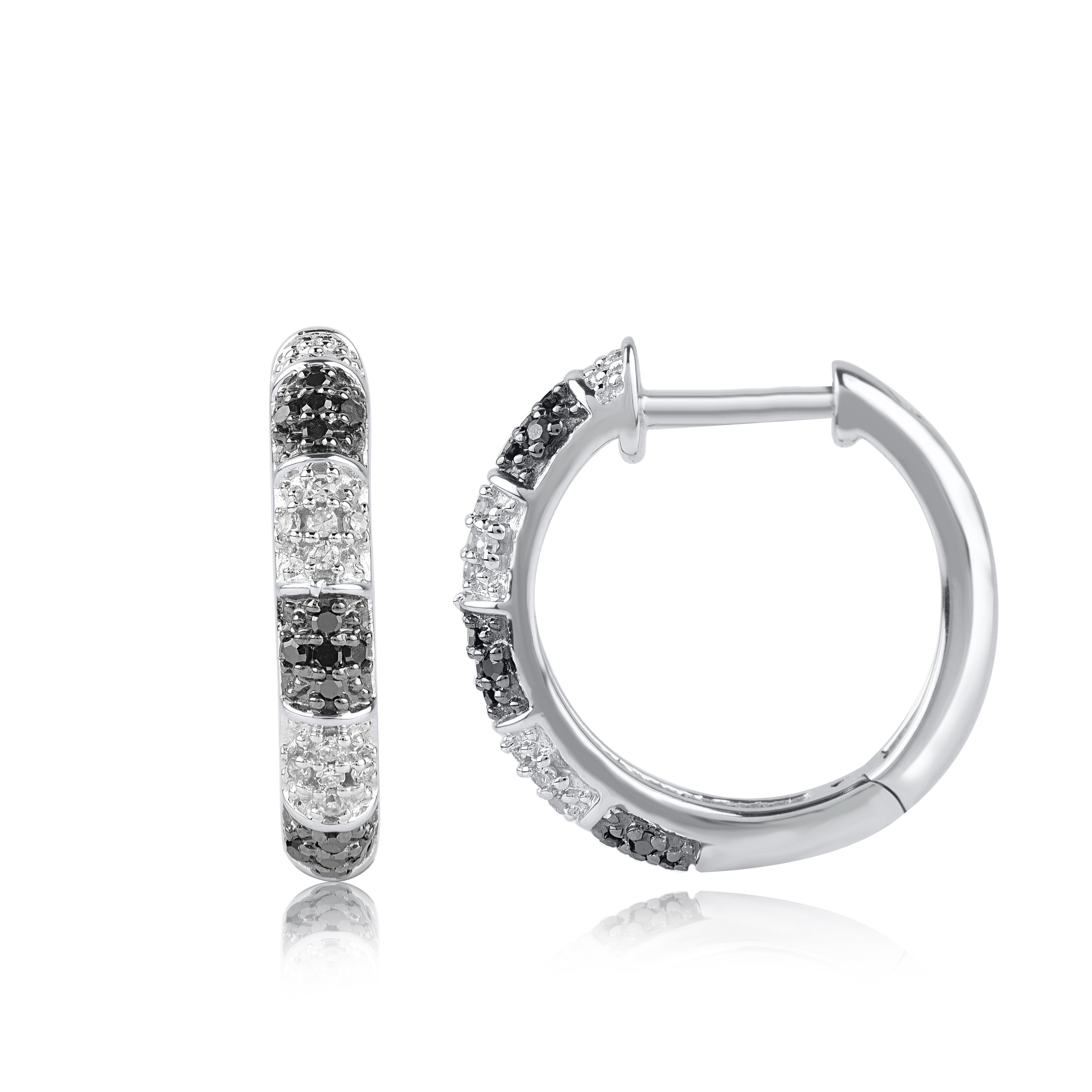 Classic and stylish diamond studded hoop earrings! perfect for daily wear. Crafted in 14 Karat white gold with 50 single cut diamond and Black treated diamond in prong setting. These earring secure with hinged backs. The white diamonds are graded as
