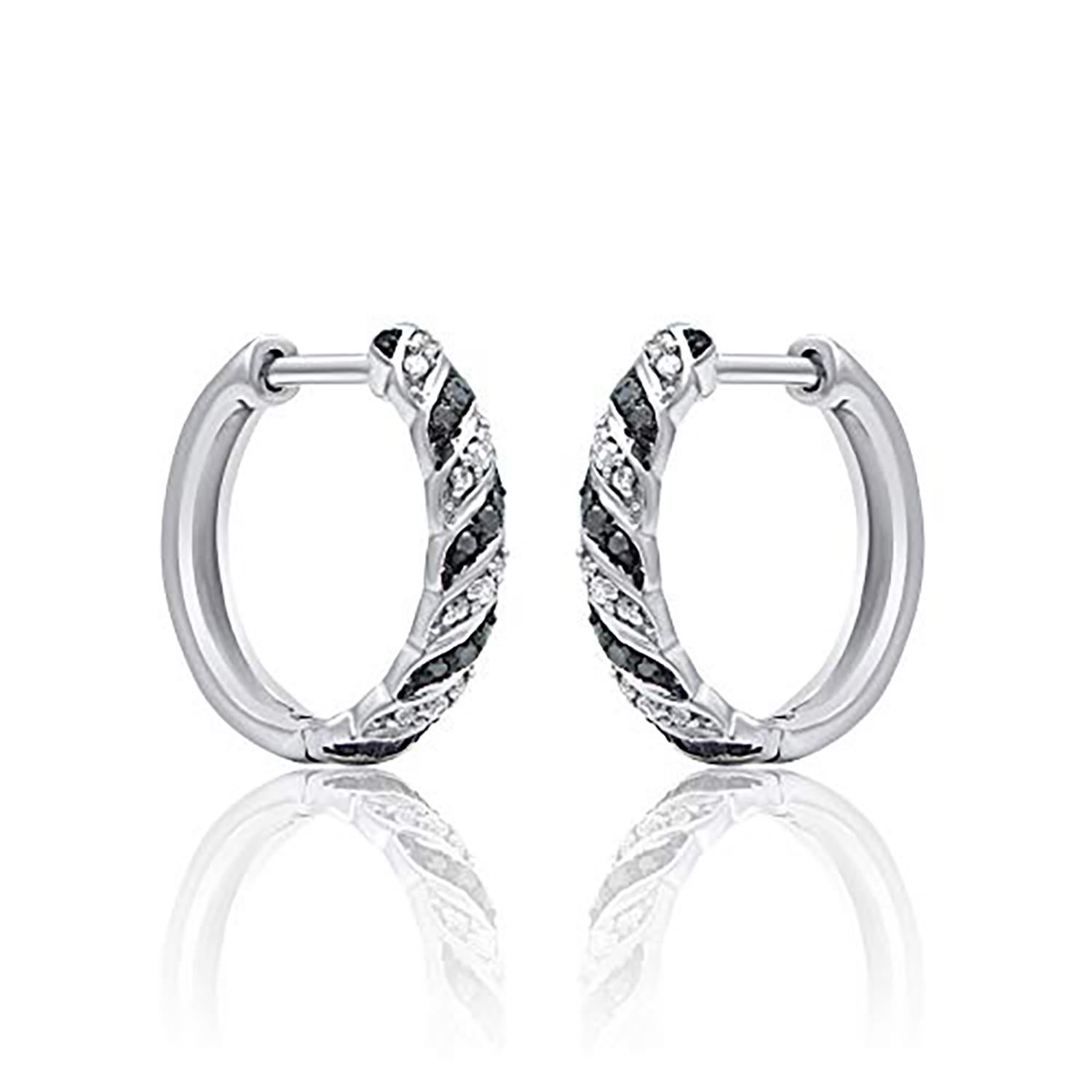 Classic and stylish diamond studded hoop earrings! perfect for daily wear. Crafted in 14 Karat white gold with 40 single cut diamond and black treated diamond in pave setting. These earring secure with hinged backs. The white diamonds are graded as