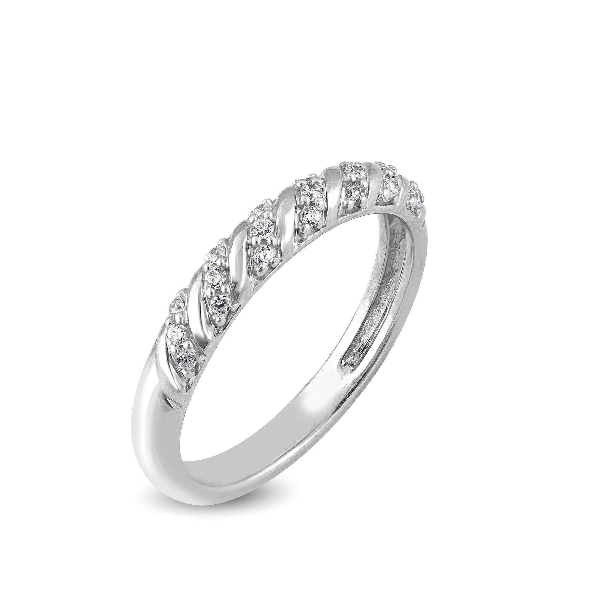 Bring charm to your look with this diamond wedding band Ring. This ring is beautifully crafted in 14 Karat white gold and embedded with 21 natural round brilliant cut diamonds in pave setting. Total diamond weight is 0.15 carat. The diamonds are