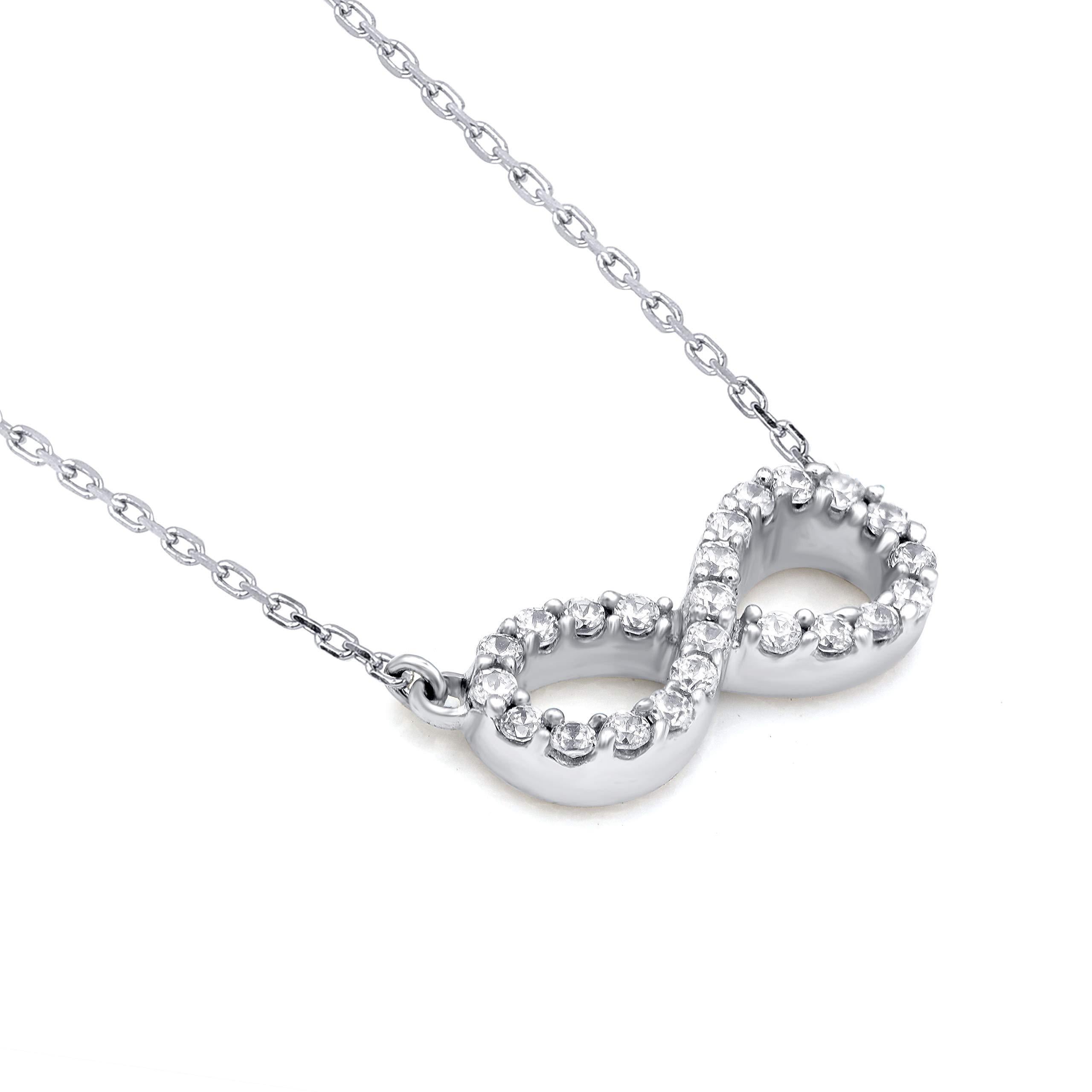 Bring charm to your look with this diamond pendant. The pendant is crafted from 14-karat white gold and features round brilliant cut 23 white diamonds in prong set, H-I color I2 clarity and a high polish finish complete the brilliant sophistication