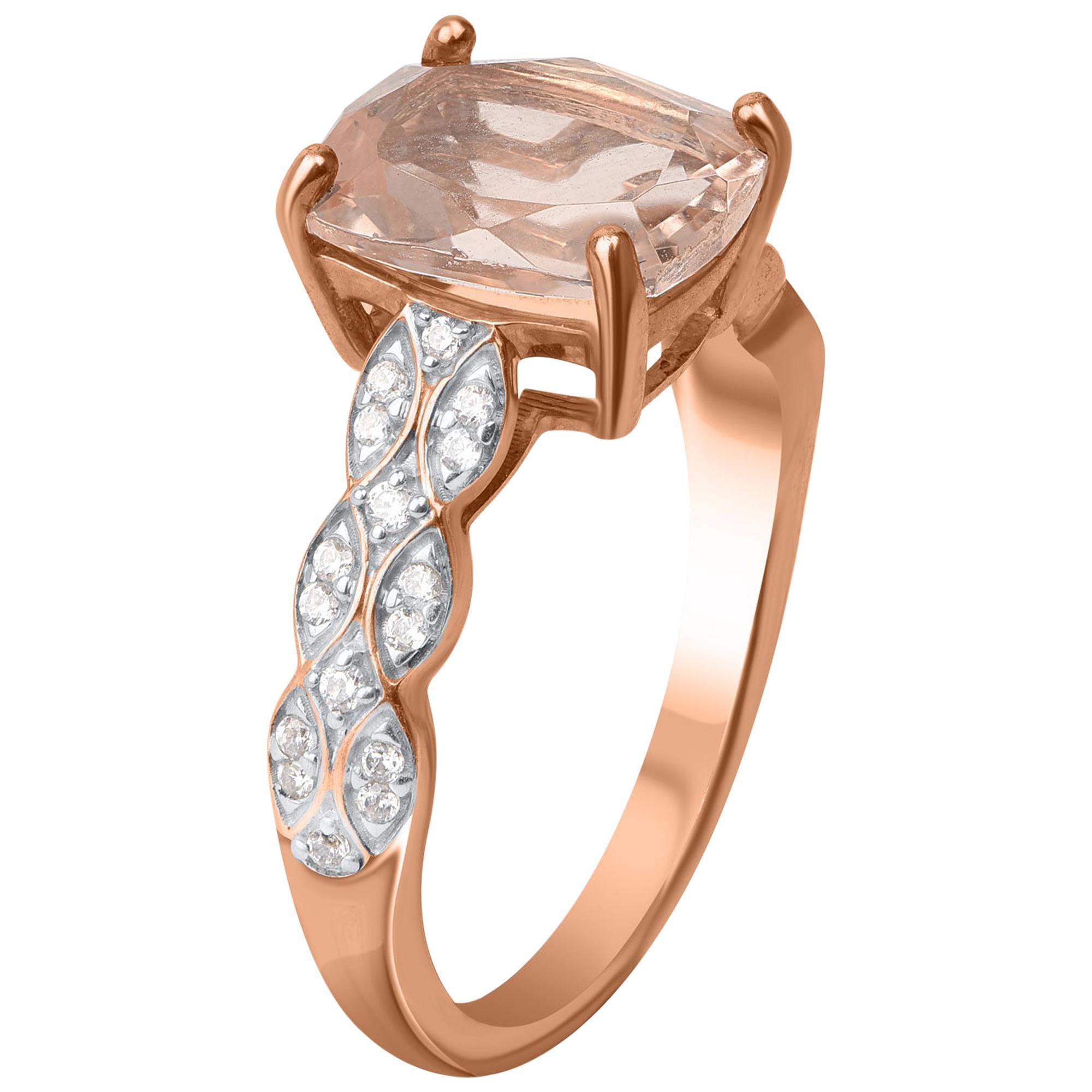 The ring is crafted in 14 KT rose gold and studded with 32 natural brilliant diamonds and 1 natural morganite in pave and prong setting. Diamonds are graded HI color, I2 clarity. 
This comfort fit diamond and natural morganite is a unique choice for