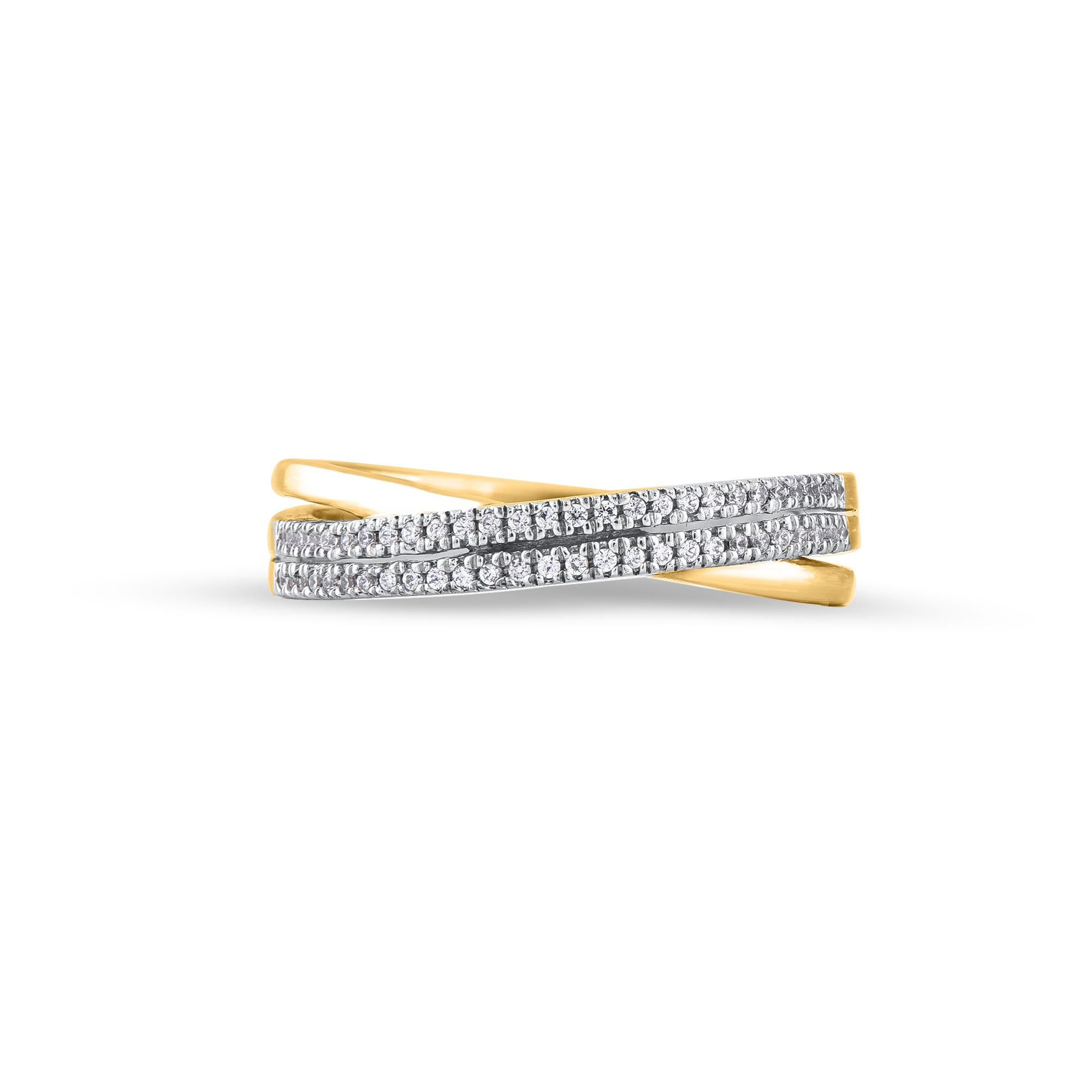 This crossover ring is expertly crafted in 14 Karat Yellow Gold and features a sparkling 54 single cut round diamonds beautifully set in prong setting. The total diamond weight is 0.15 Carat. The diamonds are graded as H-I color and I2 clarity.