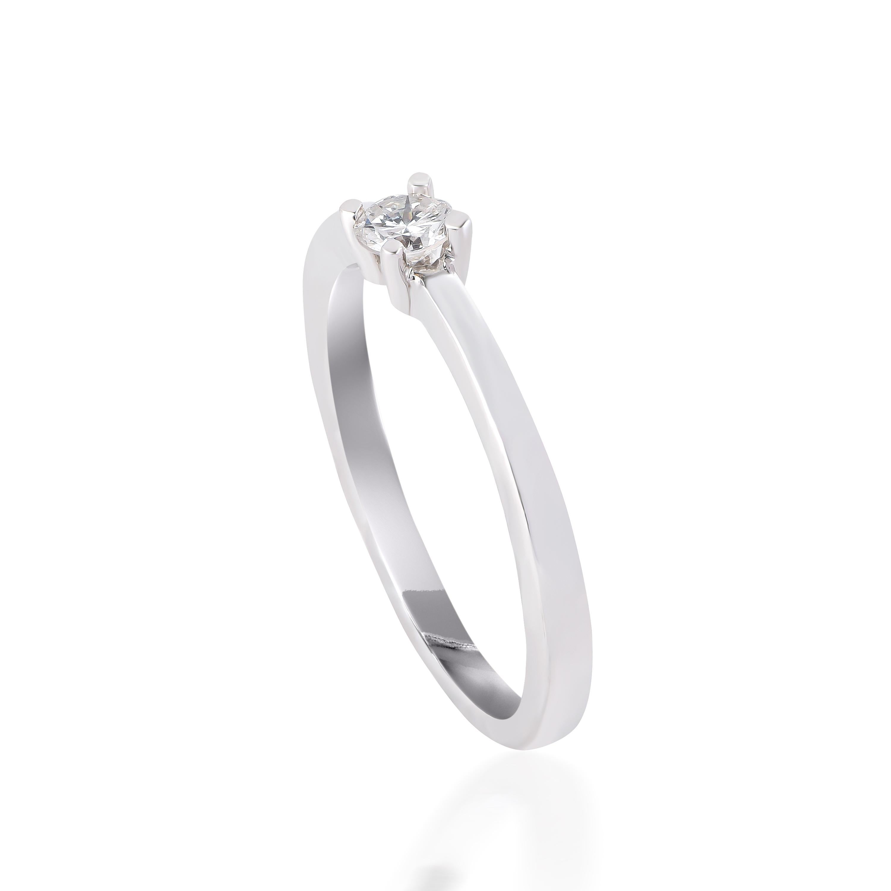 Handcrafted by our experts in 18-karat white gold and studded with 1 brilliant cut diamond set in prong setting. The diamonds are graded G-H Color, SI2 Clarity.