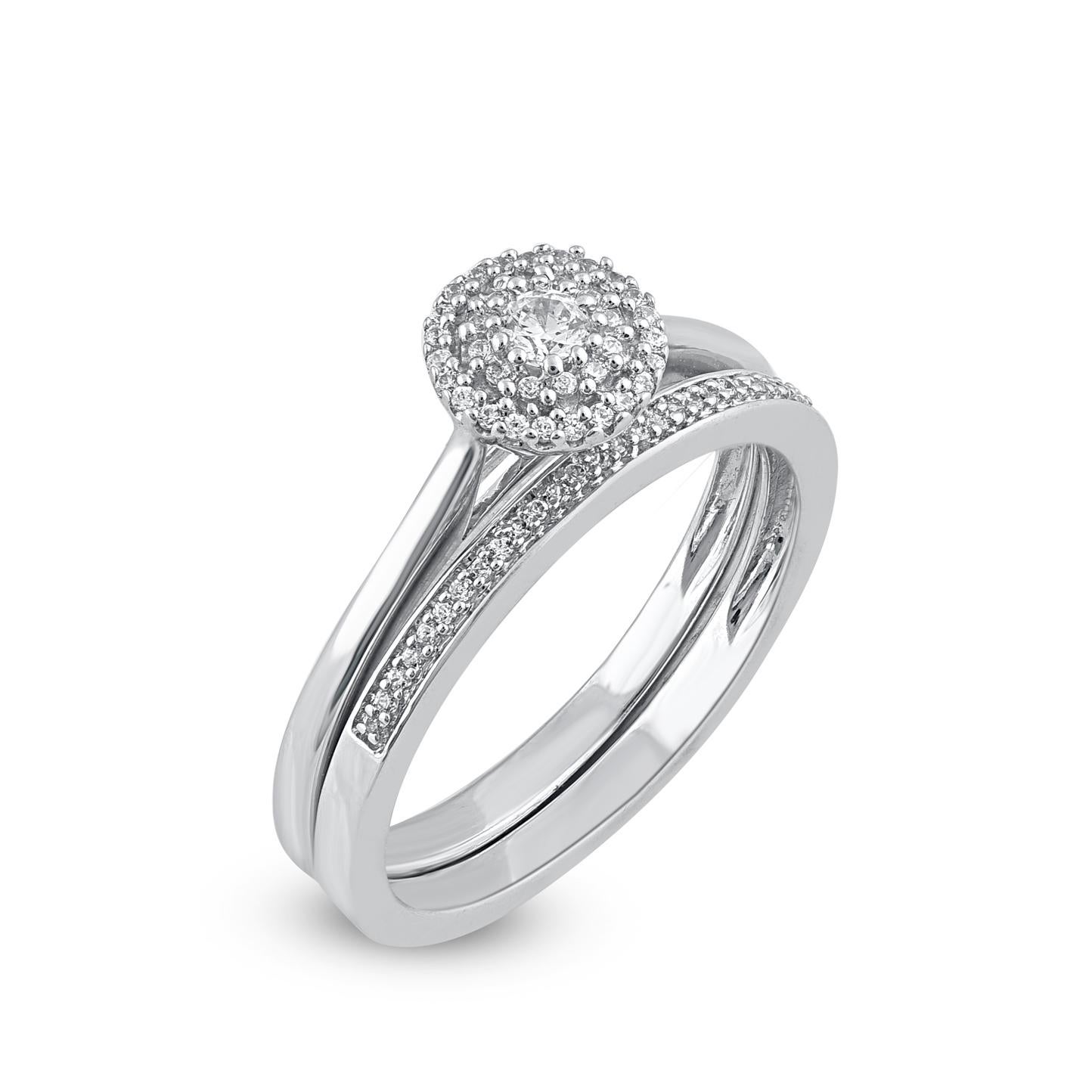Express your love for her in the most classic way with this diamond ring set. Crafted in 14 Karat white gold. This wedding ring features a sparkling 63 brilliant cut and single cut round diamond beautifully set in prong & pave setting. The total