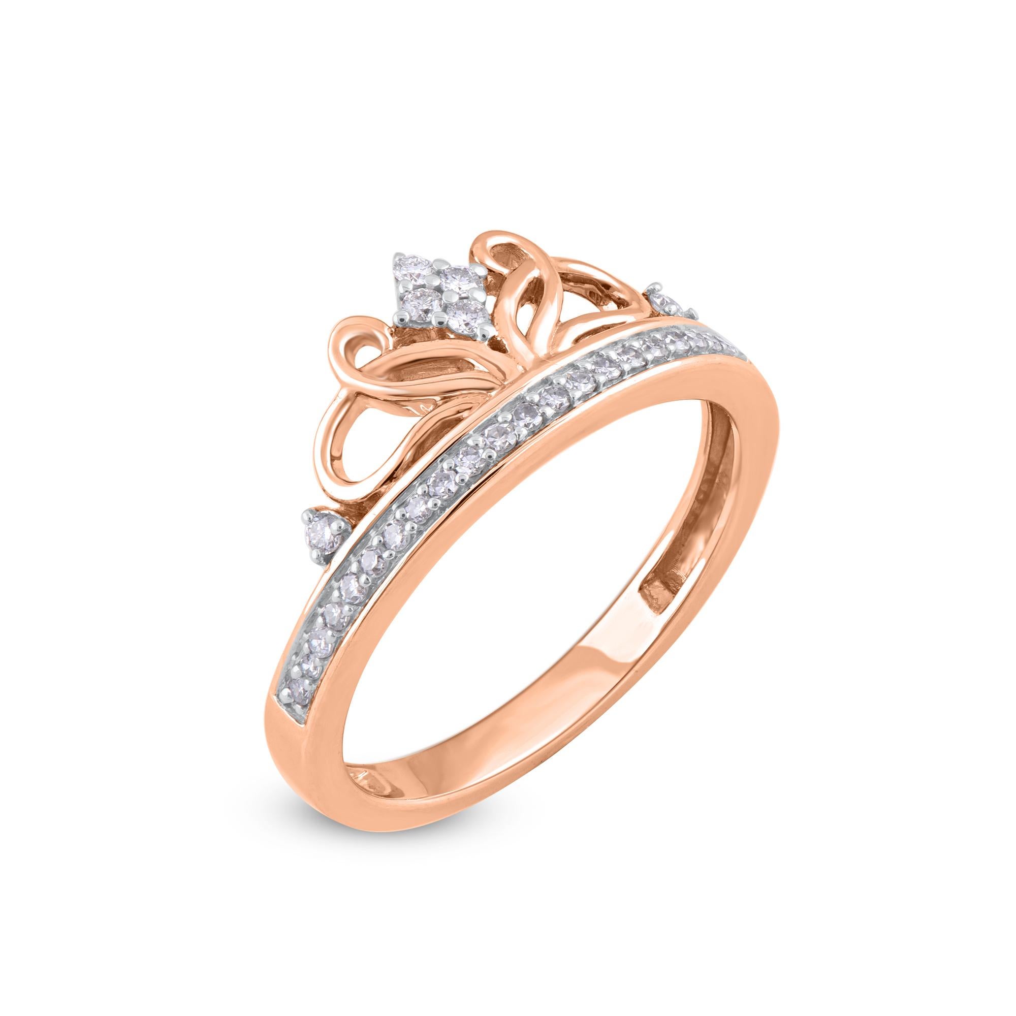 This Princess Tiara Ring is expertly crafted in 14 Karat rose gold and features 31 single cut and brilliant cut round diamonds set in prong & pave setting. The diamonds are graded as H-I color and I2 clarity. This princess tiara ring has high polish