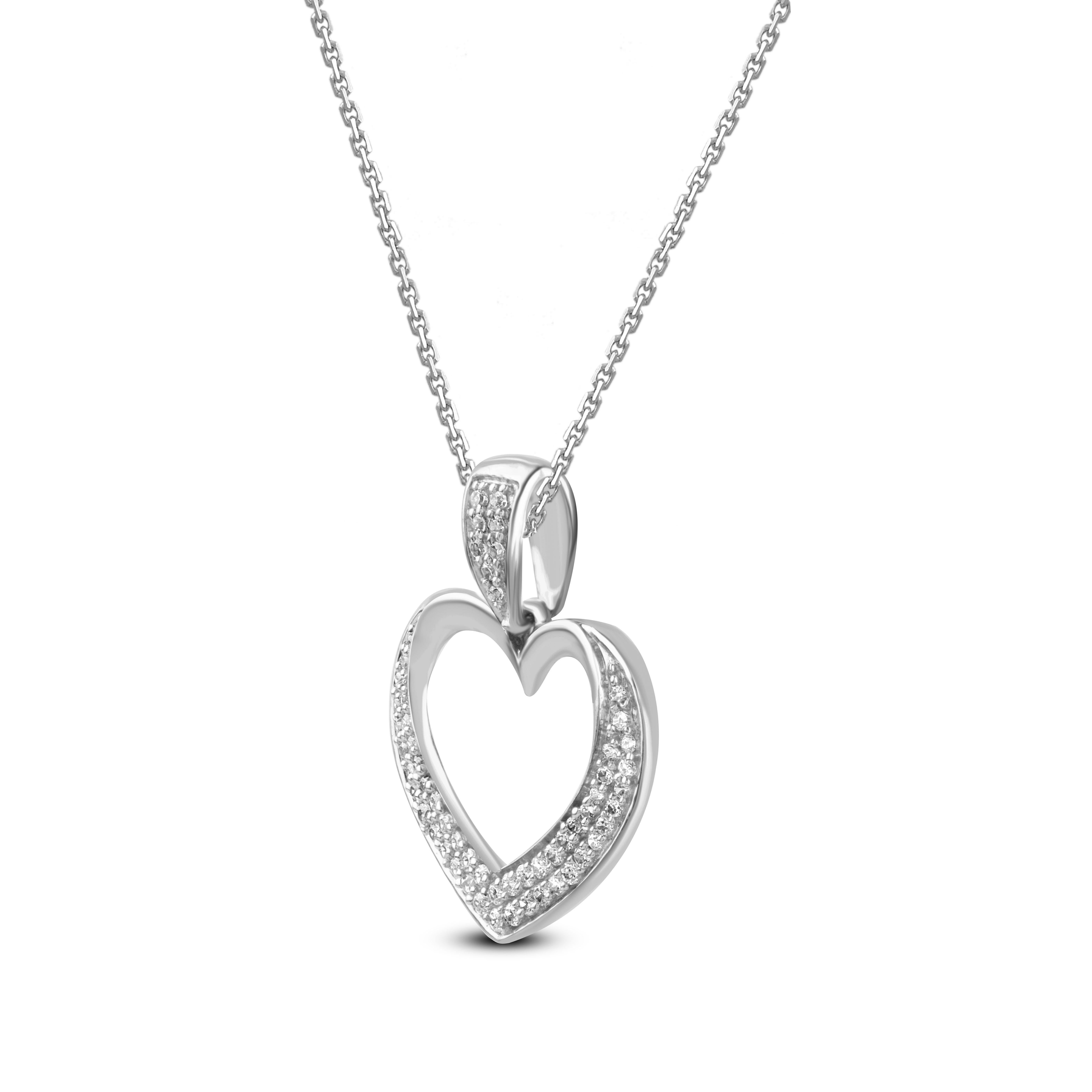 A striking addition when worn on its own, this diamond heart pendant makes a stunning impression. This pendant is crafted from 14-karat white gold and features 58 single cut diamonds set in prong setting. H-I color I2 clarity and a high polish