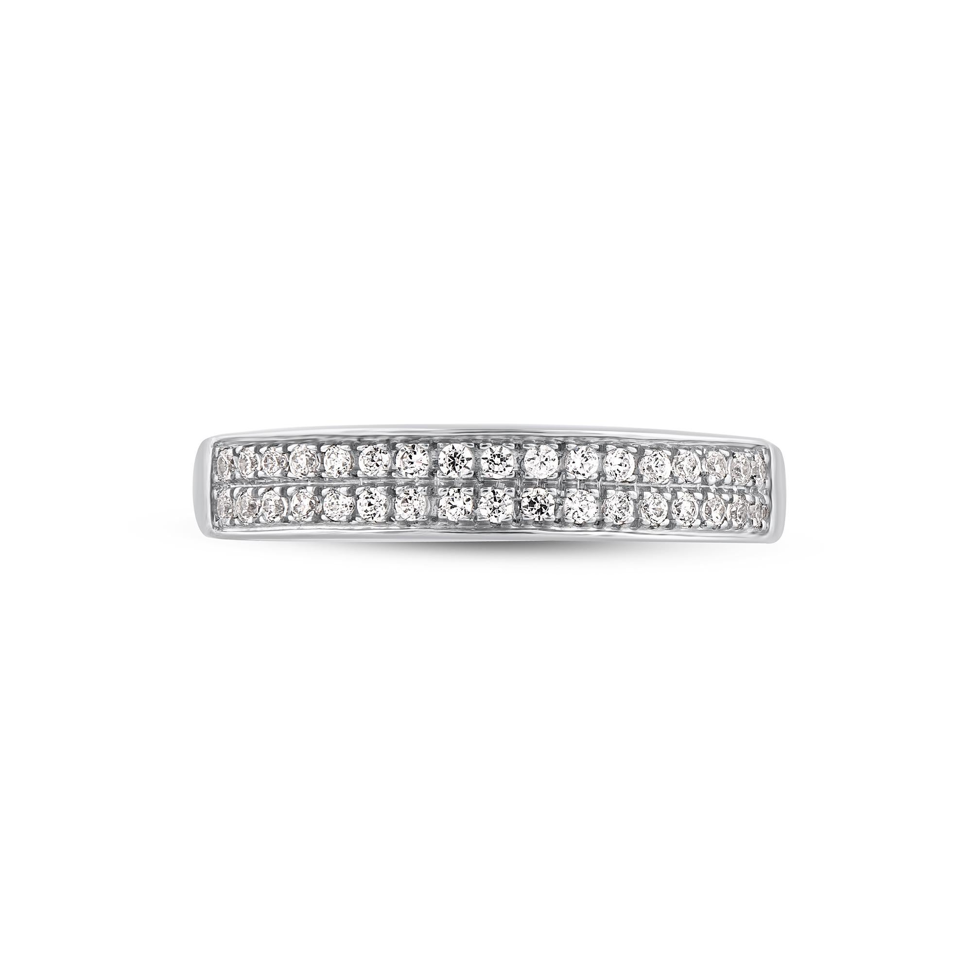Honor your special day with this exceptional diamond band ring. This band ring features a sparkling 34 brilliant cut diamonds beautifully set in pave setting. The total diamond weight is 0.25 Carat. The diamonds are graded as H-I color and I2