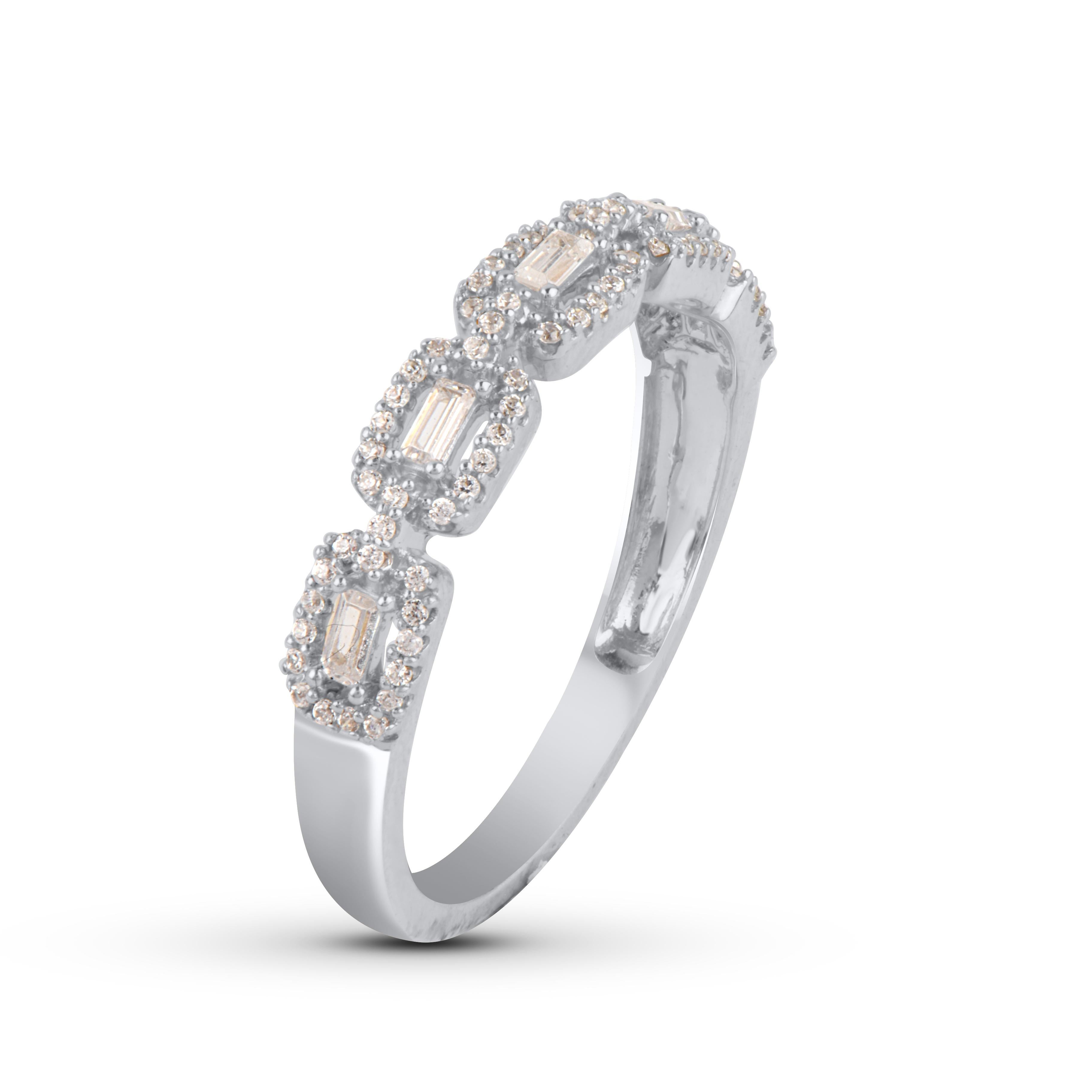 Bring charm to your look with this diamond wedding band Ring. This ring is beautifully crafted in 14 Karat white gold and embedded with 81 single cut round and baguette cut diamonds in prong setting. Total diamond weight is 0.25 carat. The diamonds