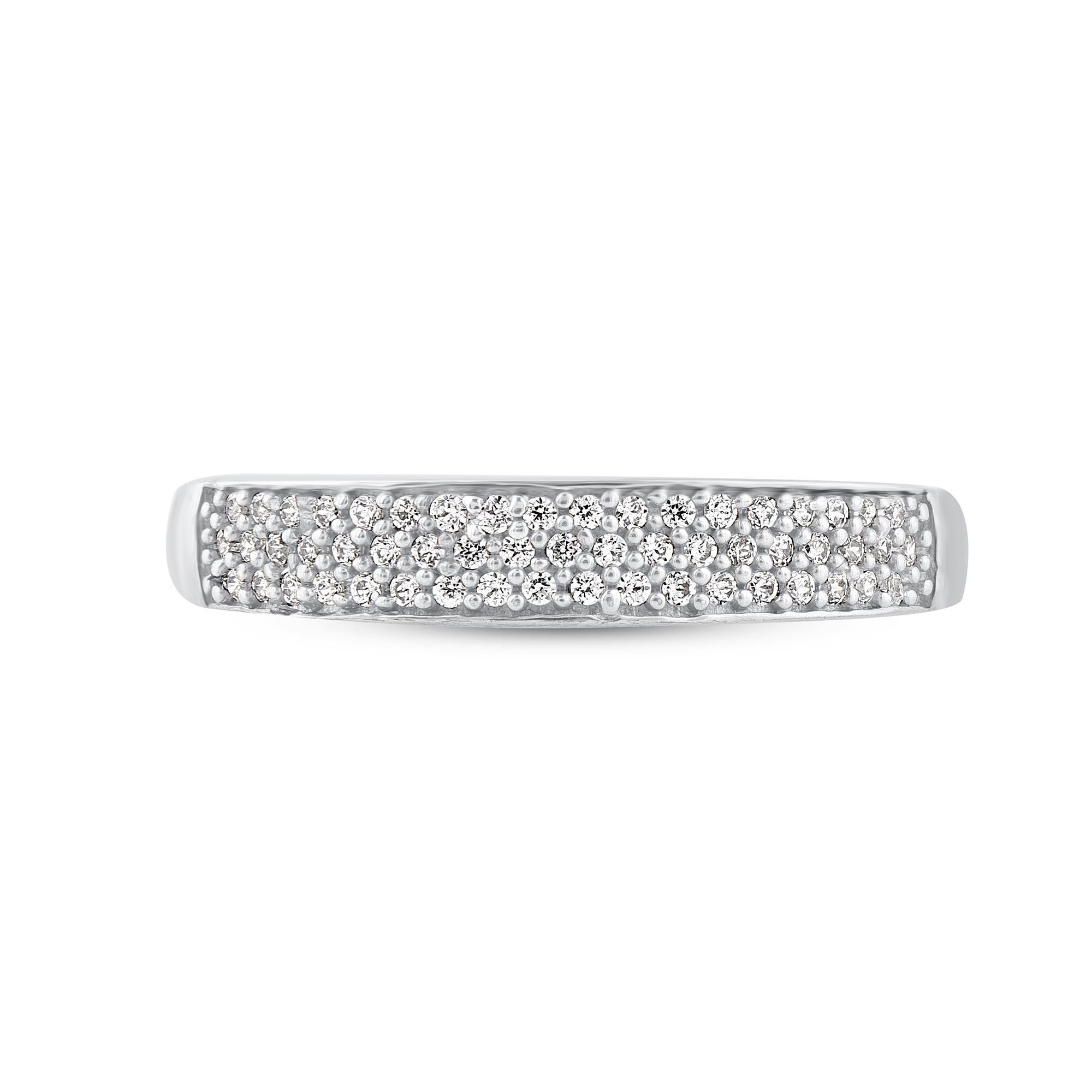 Bring charm to your look with this diamond wedding band Ring. This ring is beautifully crafted in 14 Karat white gold and embedded with 55 natural round single cut diamonds in pave setting. Total diamond weight is 0.25 carat. The diamonds are graded