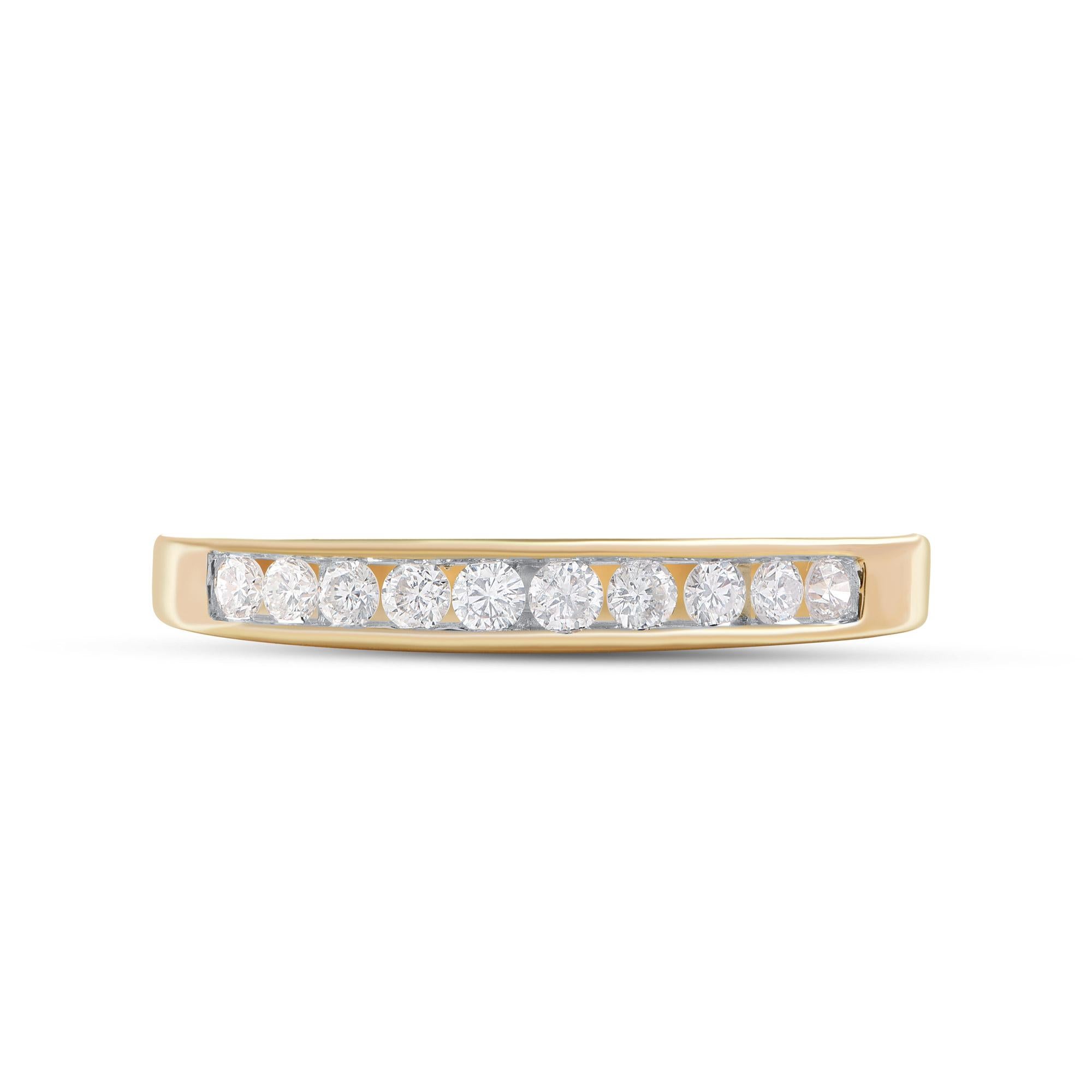 Bring charm to your look with this diamond wedding band Ring. This ring is beautifully crafted in 14 Karat yellow gold and embedded with 10 natural brilliant cut diamonds in channel setting. Total diamond weight is 0.25 carat. The diamonds are