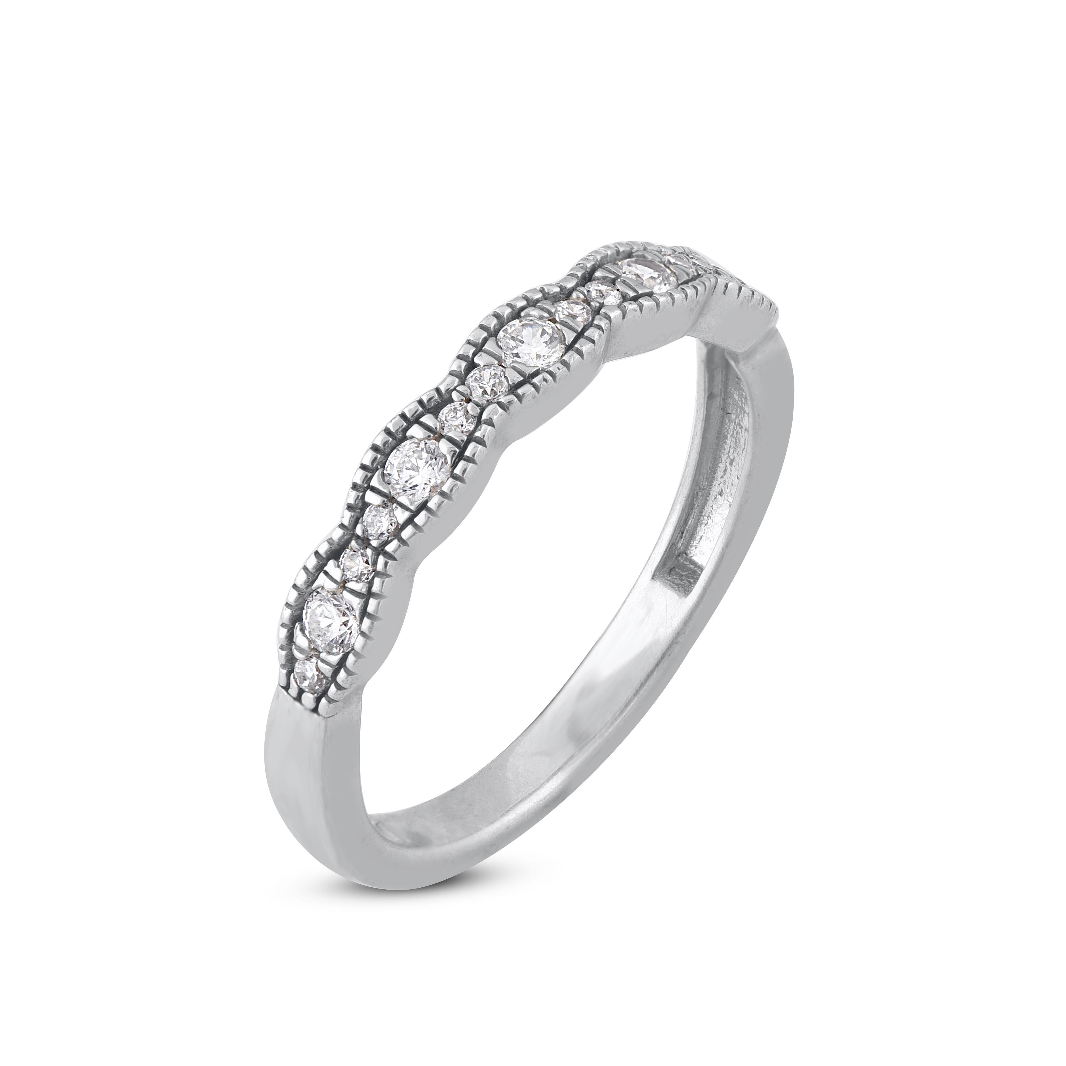 Celebrate your years together with this elegant scalloped diamond band. These band ring are studded with 15 brilliant cut natural diamonds in 14 karat white gold in prong setting. Total diamond weight is 0.25 carat. The white diamonds are graded as