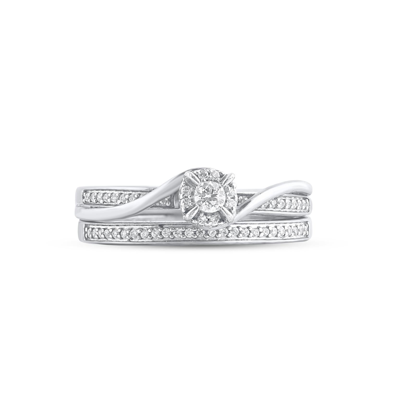 This timeless diamond bridal set will make the moment special. Crafted in 14 Karat white gold. This wedding ring features a sparkling 54 brilliant cut and single cut round diamonds beautifully set in prong and pave setting. The total diamond weight
