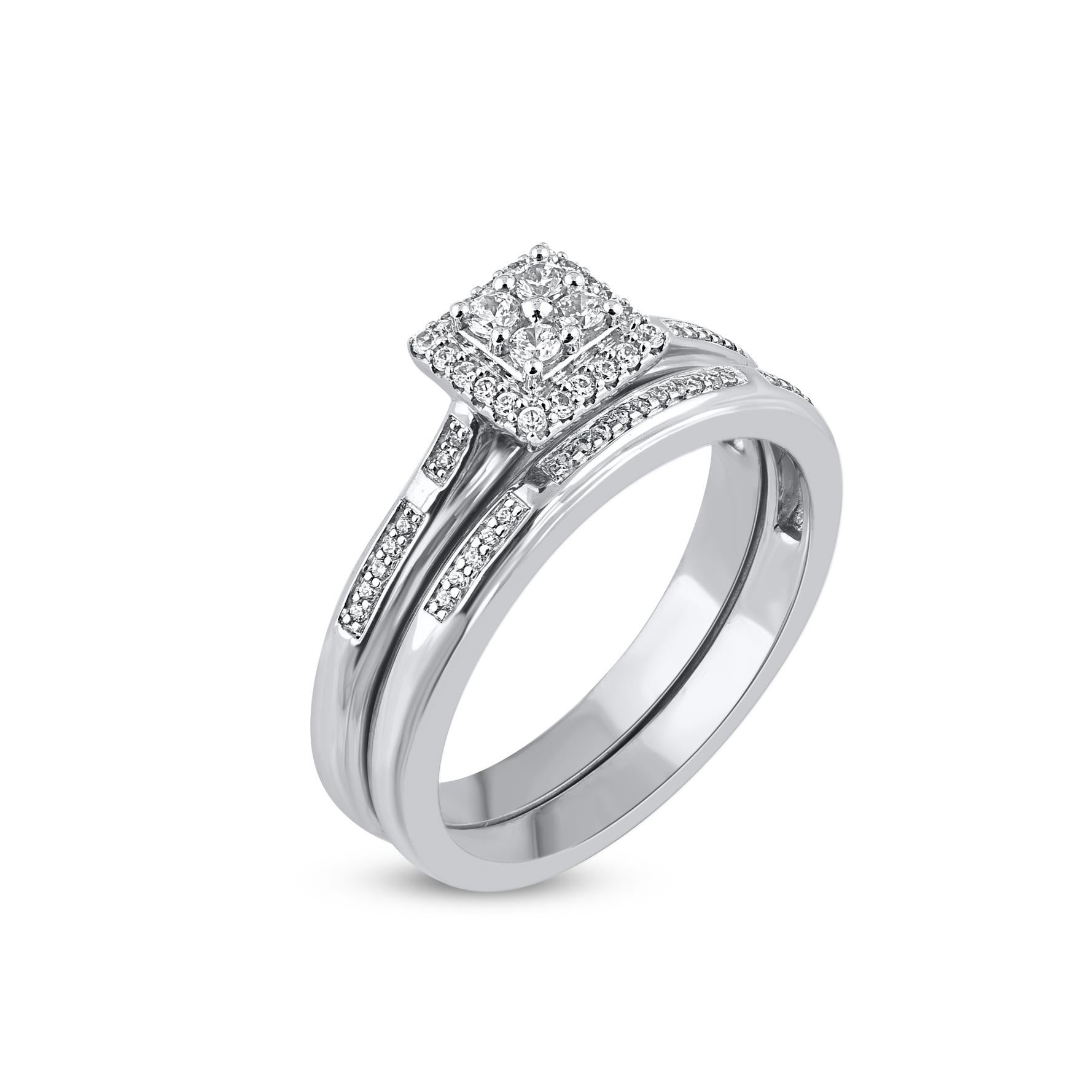 Sweet and simple in design, this diamond bridal set is sure to charm on your big day. Crafted in 14 Karat white gold. This wedding ring features a sparkling 58 brilliant cut and single cut round diamond beautifully set in prong & pave setting. The