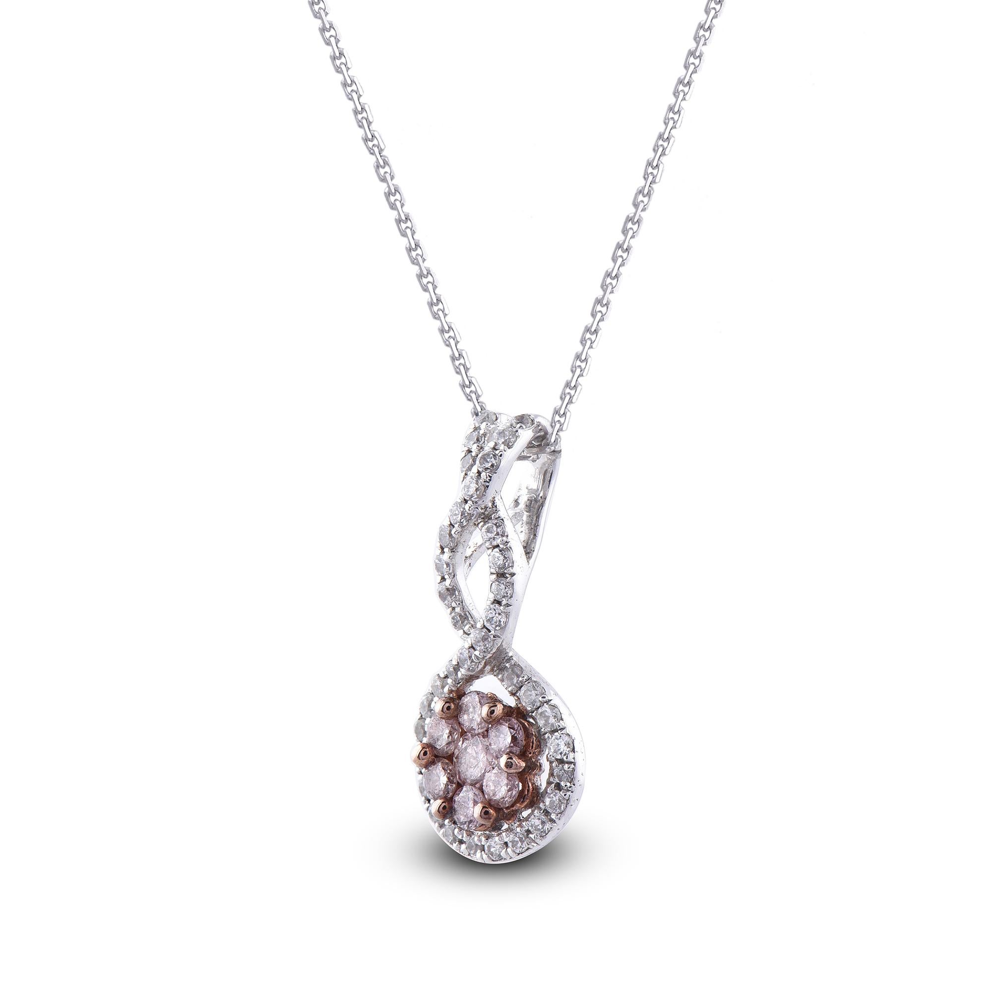 Give a touch of glamour to your fine jewelry collection with this diamond swirl cluster pendant. It features a beautiful design that is embellished with 36 round and 7 pink diamonds set in prong and pressure setting, H-I color I1 clarity. Luxurious