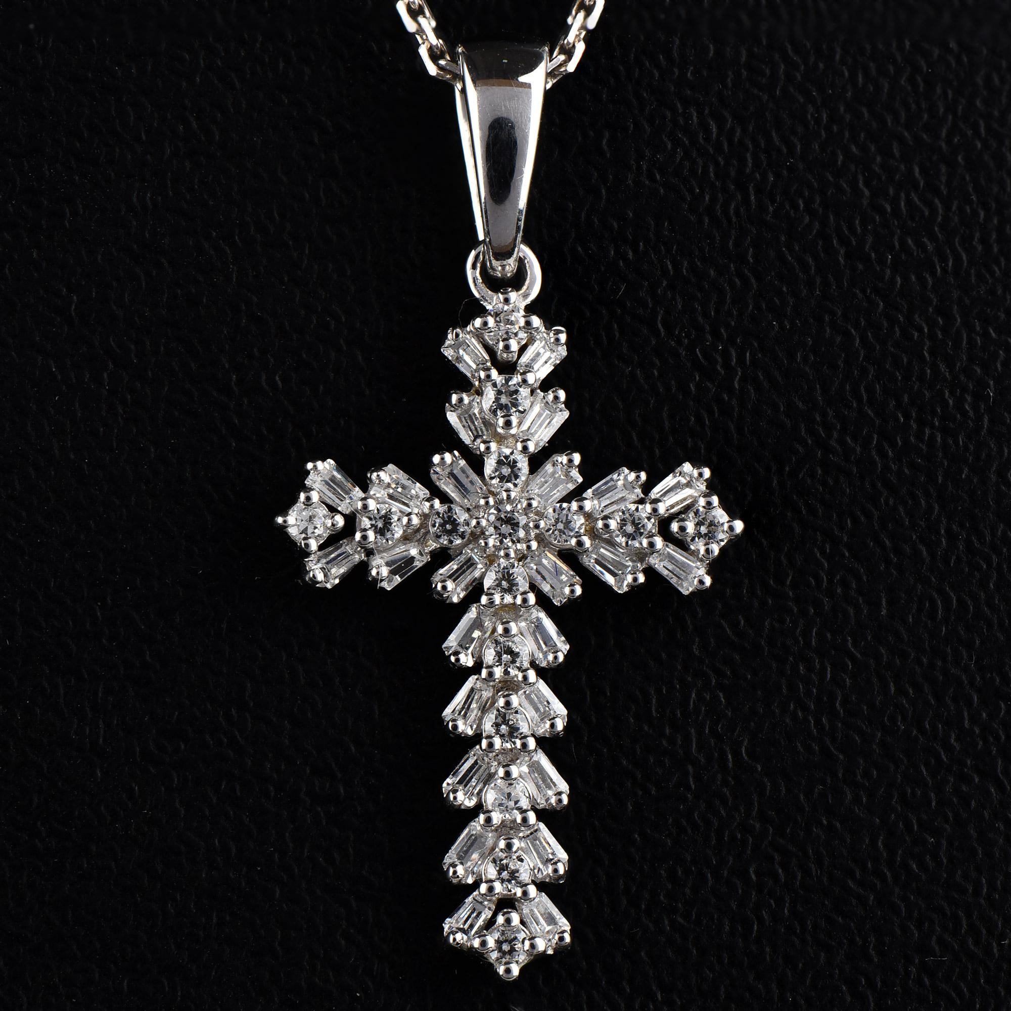 Faith and Fashion combine in this sparkling diamond cross pendant. The pendant is crafted from 14 karat gold in your choice of white, rose, or yellow, and features Round-16 and 26 baguette cut diamond set in Prong setting. The total diamond weight