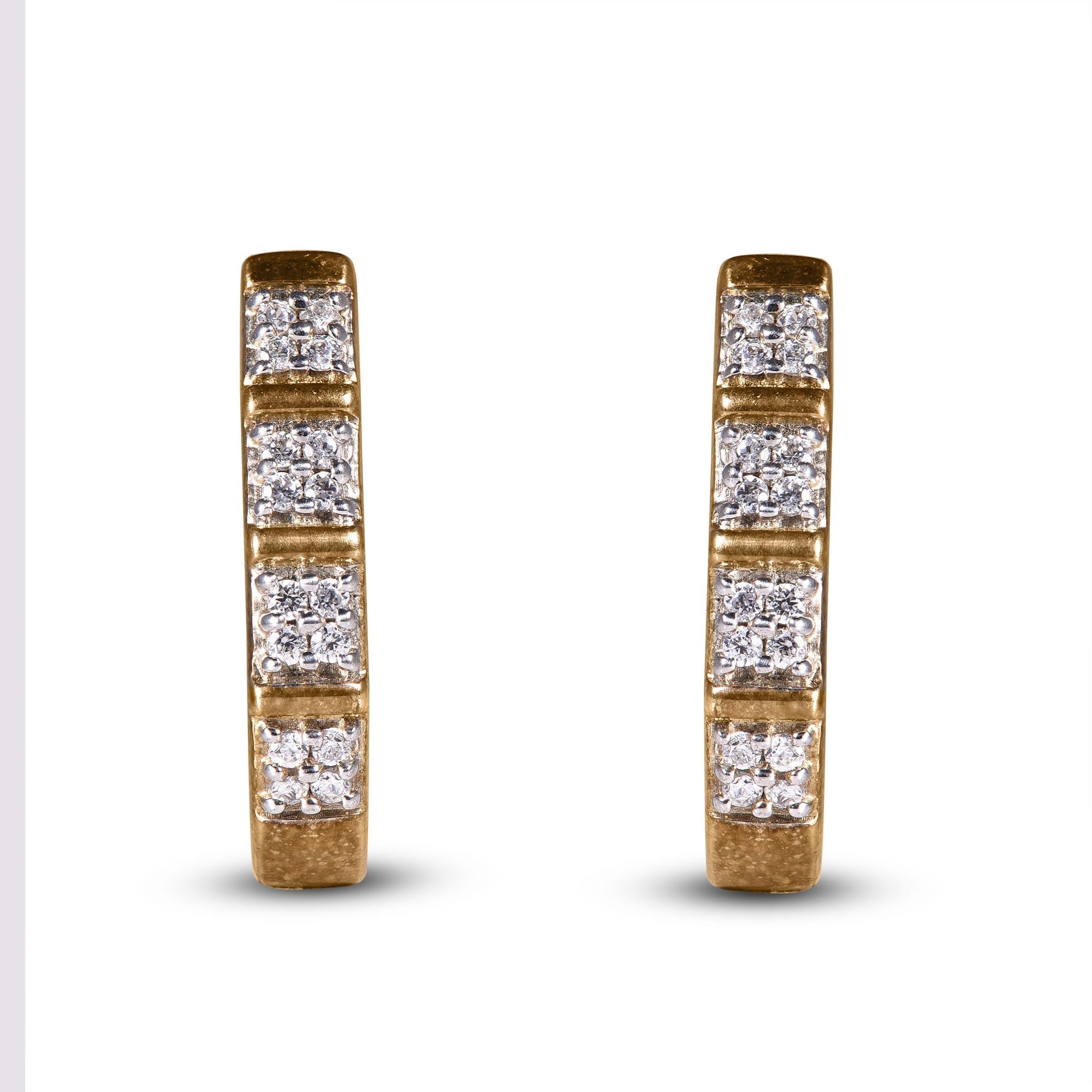 These exquisite diamond huggie earrings offer beauty equaled only to her own.These earrings feature clusters of 32 round brilliant dazzling diamond set in prong setting, and shines brightly in H-I color I2 clarity. These timeless hoop earrings that