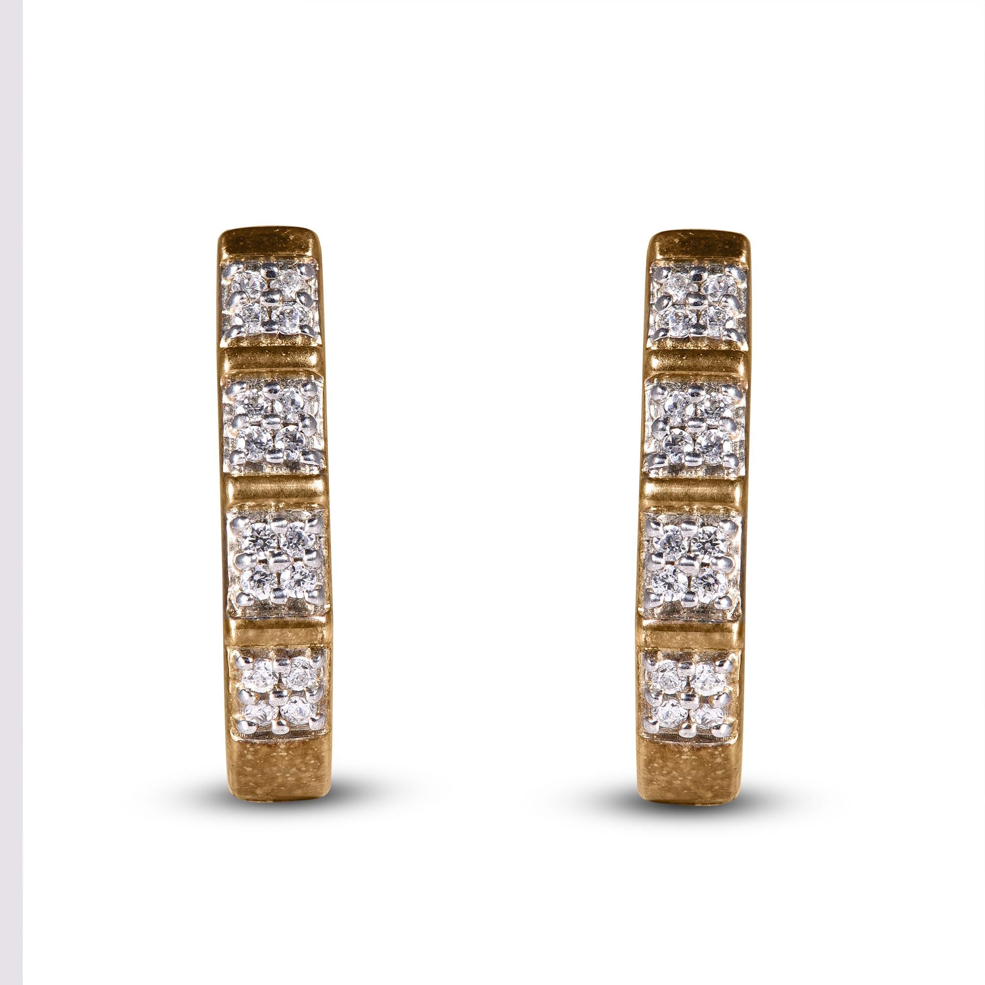 These exquisite diamond huggie earrings offer beauty equaled only to her own. These earrings feature clusters of 32 round brilliant dazzling diamond set in prong setting, and shines brightly in H-I color I2 clarity. These timeless hoop earrings that