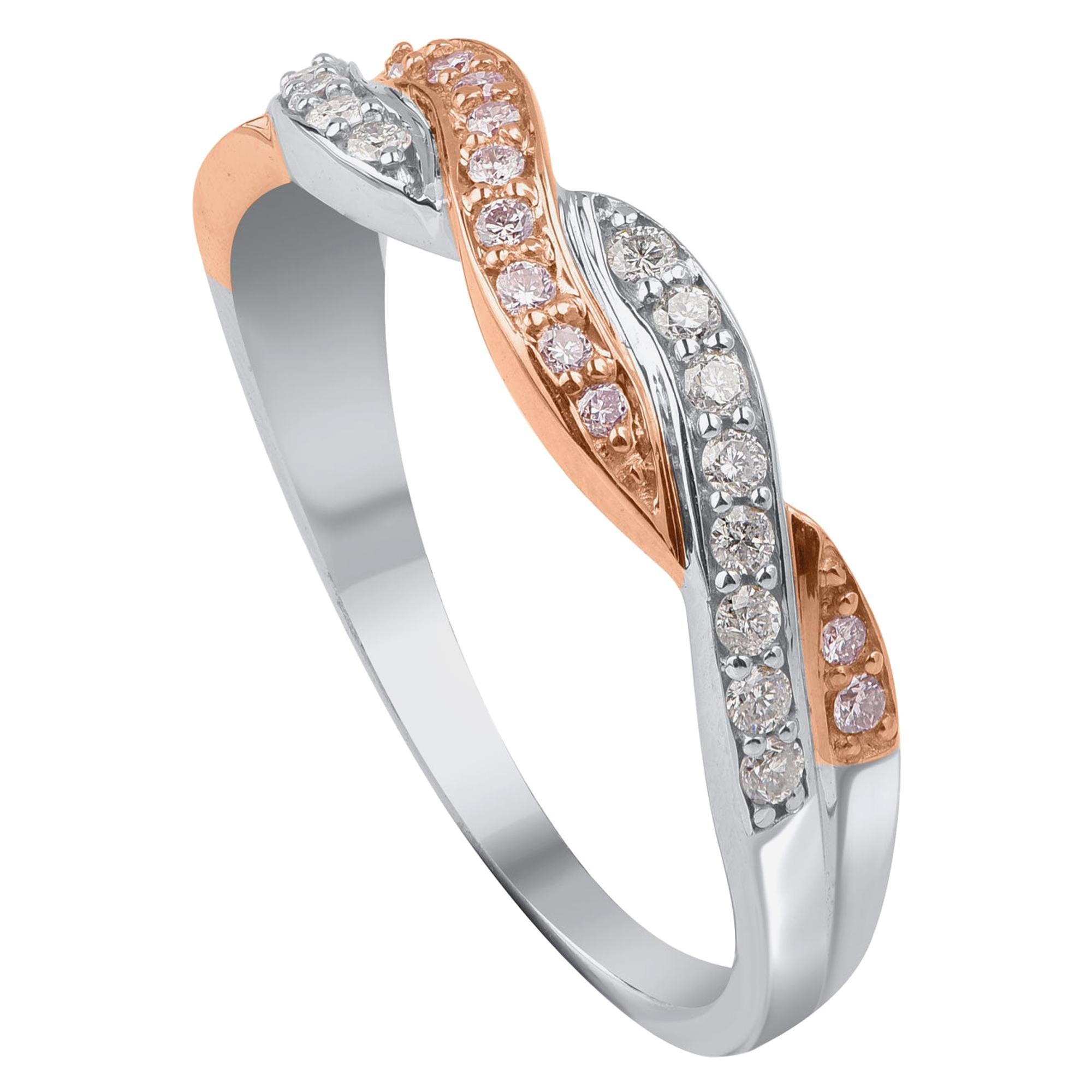 Studded with 16 round white and 13 round natural pink rosé diamonds in pave setting and crafted by experts in 18 kt white and rose gold. Diamonds are H-I Color, I2 Clarity. 

Ring size is US size 7 and can be resized on request.