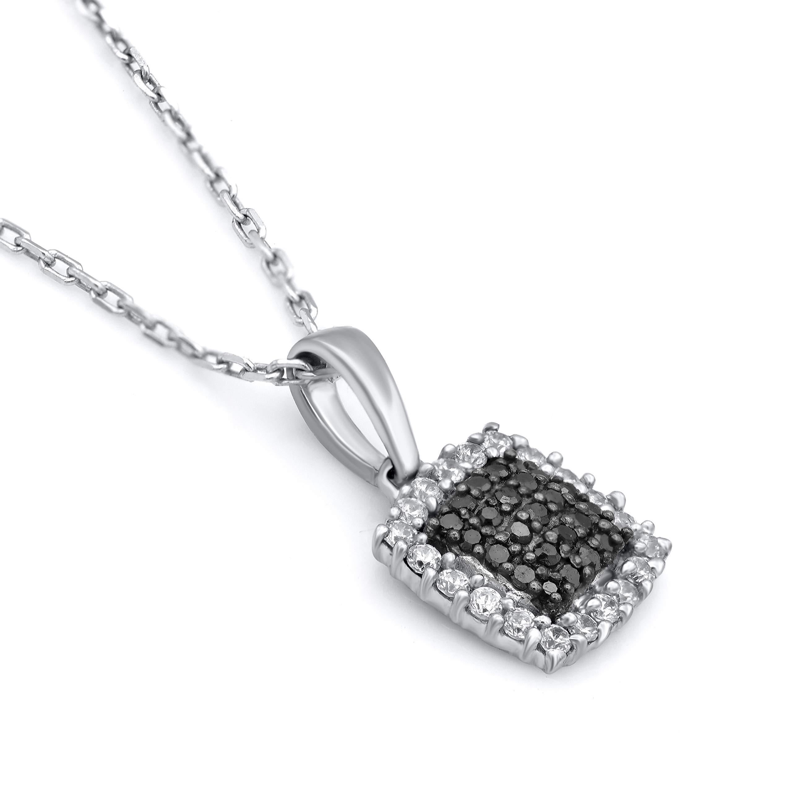 Top off your casual or dressy looks with this diamond pendant. Designed in 14 Karat white gold, studded with 45 brilliant cut & black treated diamonds in prong setting. it will come along with a cable chain. The diamonds are graded H-I Color, I2