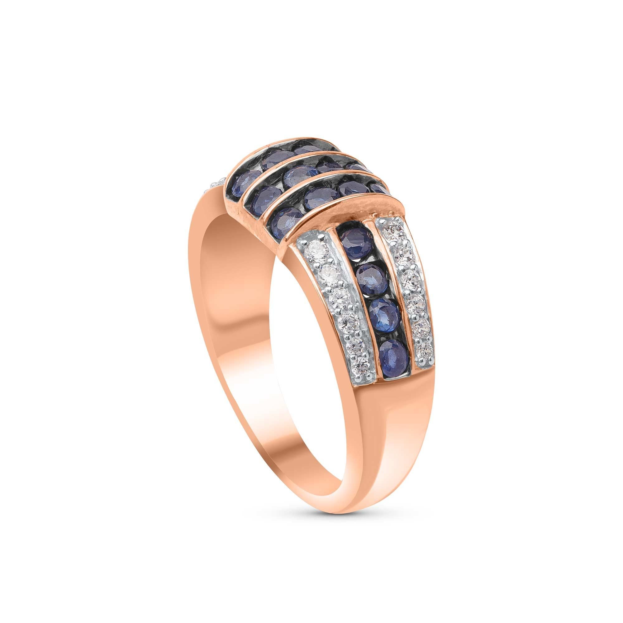 This wedding band features 24 brilliant natural diamond and 20 natural blue sapphire set beautifully in pave and nick setting - crafted by our in-house experts in 18 kt rose gold. The diamonds are graded H-I Color, I2 Clarity.  

Metal color and