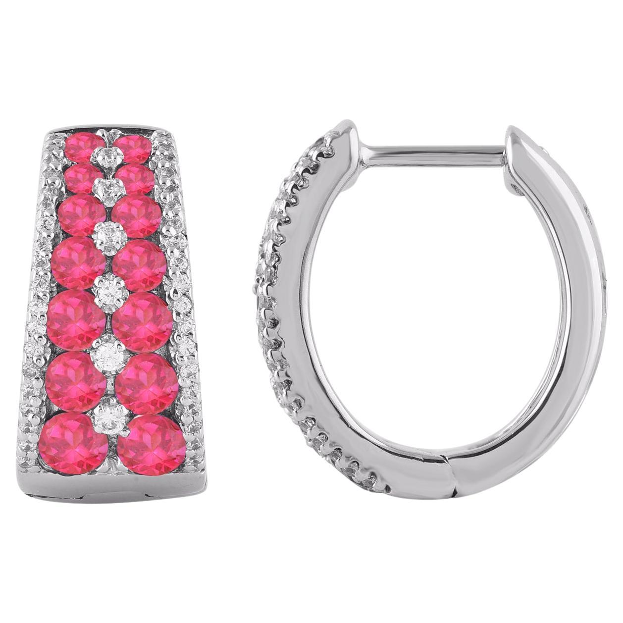 Graceful and modern, this ruby hoop earrings display your glamorous style. Crafted in 14K white gold with 28 round ruby and 88 round brilliant and single cut diamond in prong and half channel setting. These earring secure with post back. The white