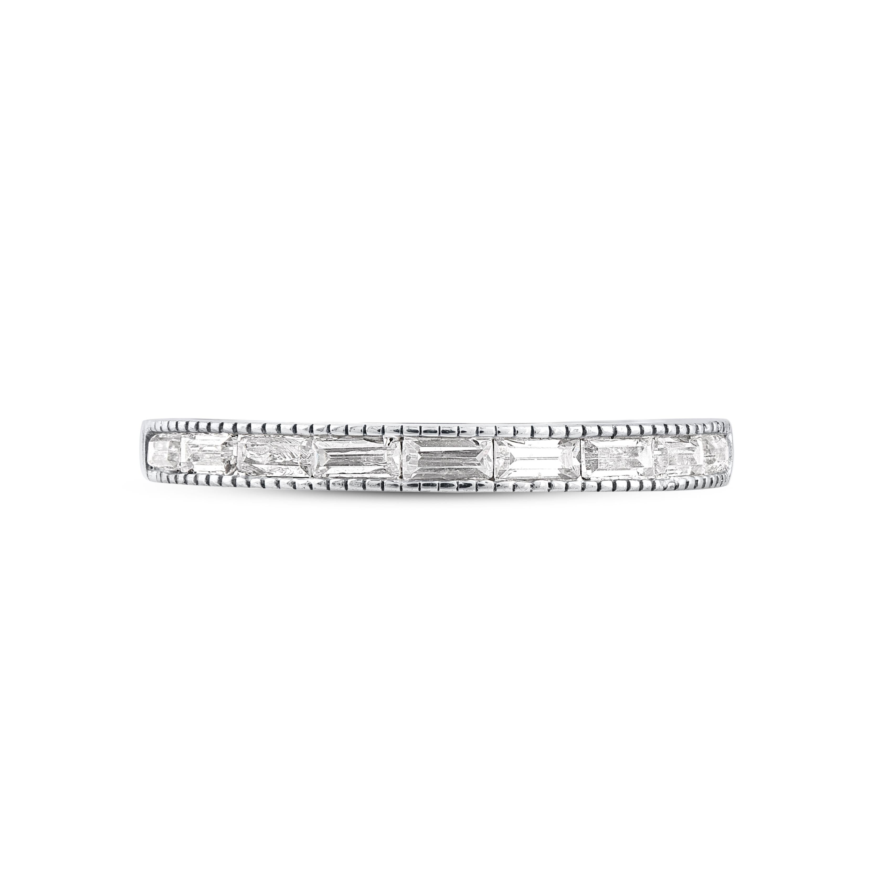 Honor your special day with this exceptional diamond band ring. This band ring features a sparkling 9 baguette diamonds beautifully set in channel setting. The total diamond weight is 0.33 Carat. The diamonds are graded as H-I color and I2 clarity.